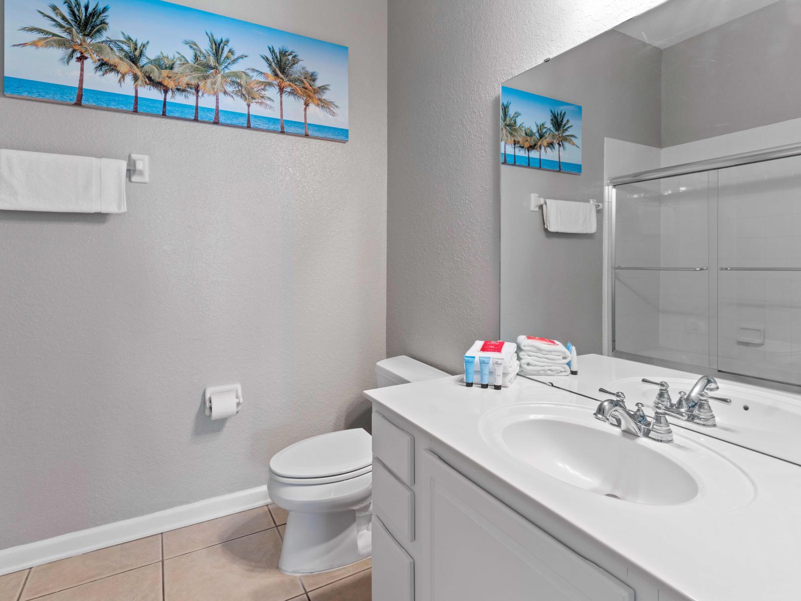 Discover Bathroom 2, complete with a versatile tub/shower combination, offering both convenience and comfort for your stay.