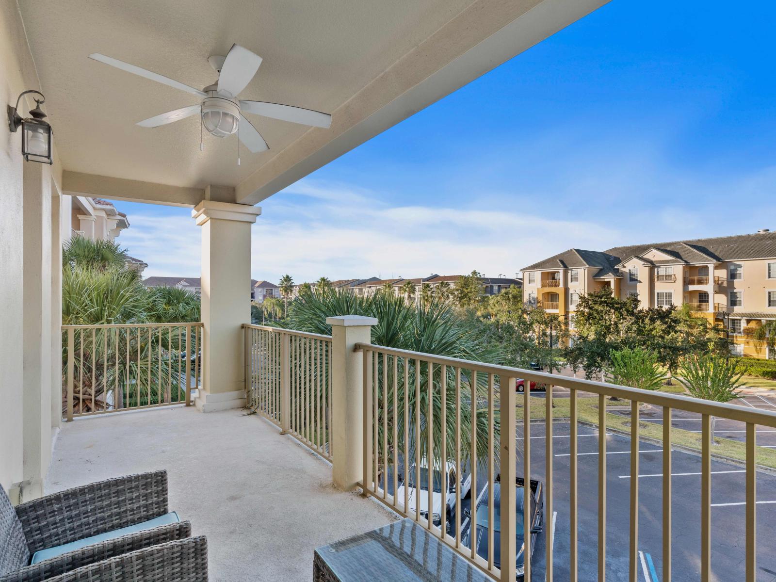 Relaxing private balcony of the condo in Orlando  - Plenty of outdoor sitting space - Refreshing atmosphere - Stunning surrounding views - Cozy space for morning coffee