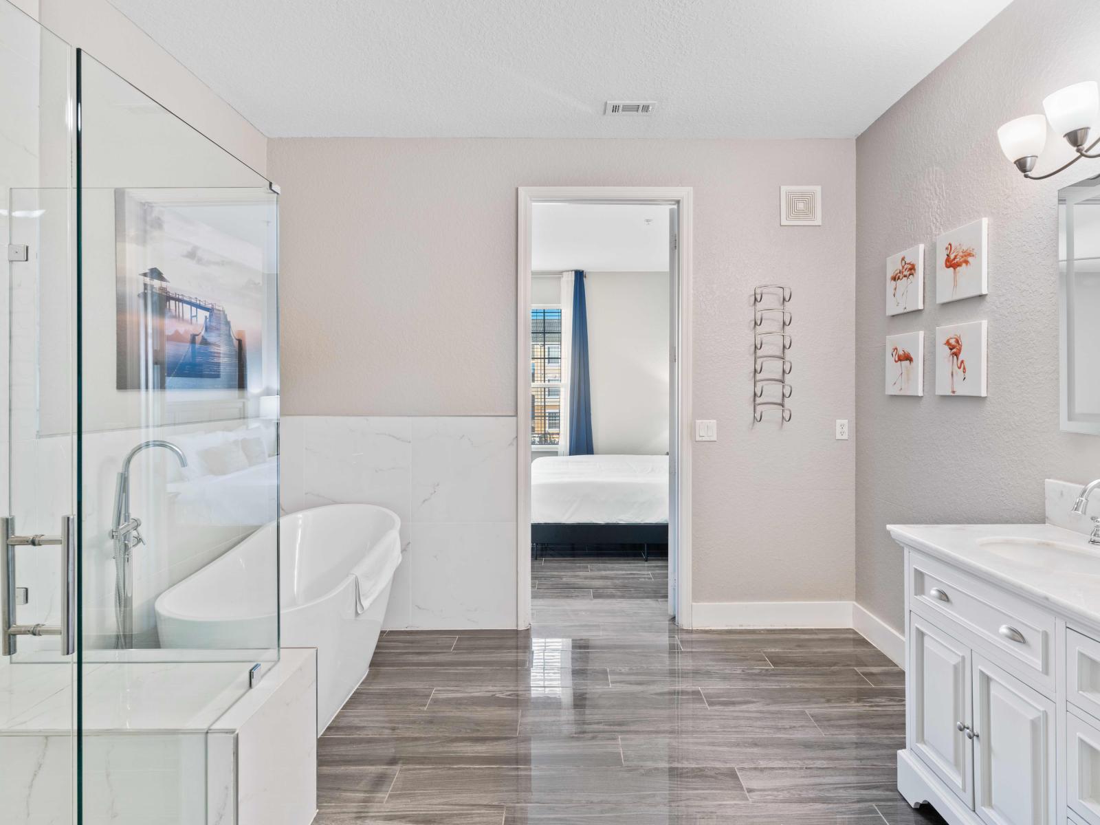 This space features a rejuvenating soaking tub and a spacious walk-in shower, offering the perfect retreat for unwinding after a long day of adventure.