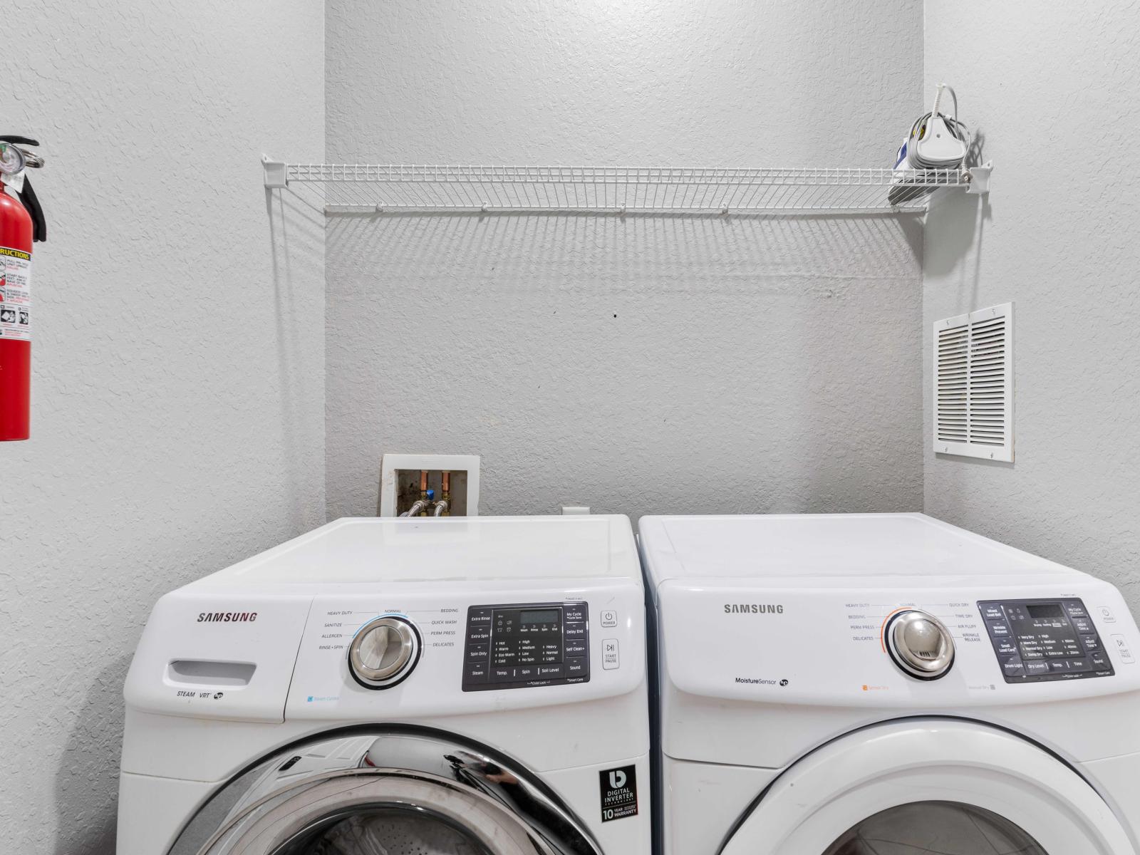 Enjoy the convenience of having a laundry area within the condo in Orlando - The laundry area features modern appliances, a washer and dryer, ensuring that you can easily keep your clothes clean - Say bye to the hassle of finding a laundromat