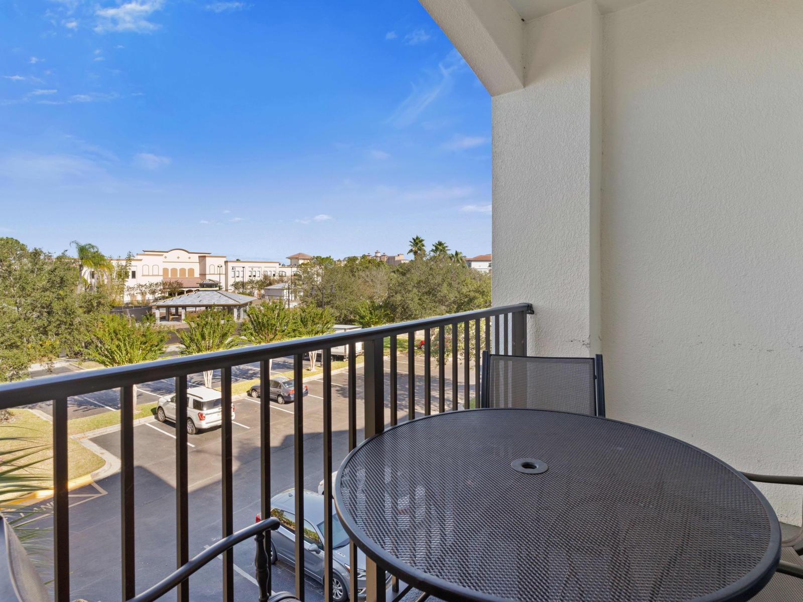 A serene balcony adorned with cozy chairs, beckoning for moments of relaxation and contemplation.