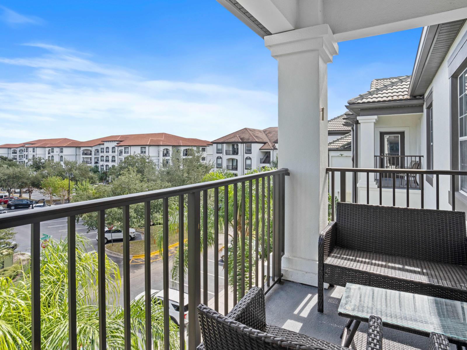 Balcony Bliss: Savor the beauty of nature from your private vantage point – a balcony with an enchanting lawn view, perfect for relaxation and rejuvenation