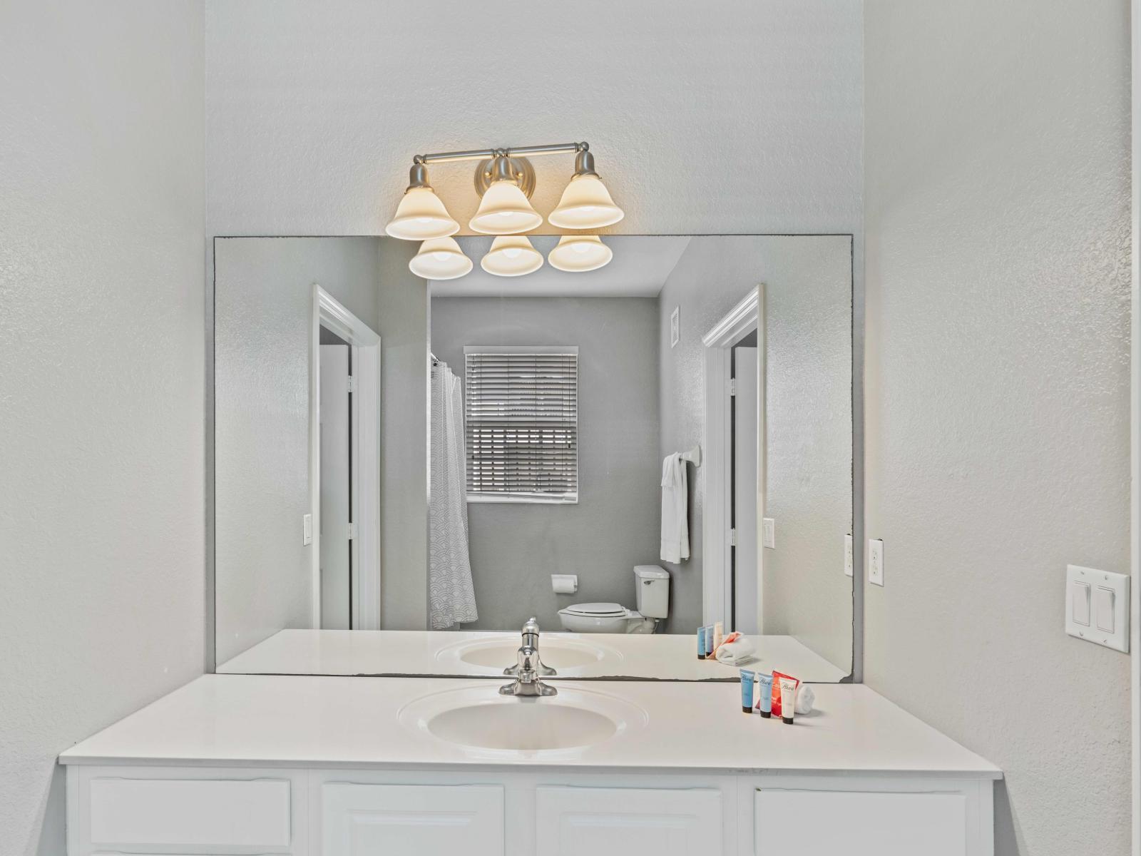 Unwind in Bathroom 2, featuring a convenient tub/shower combination for a soothing bathing experience.