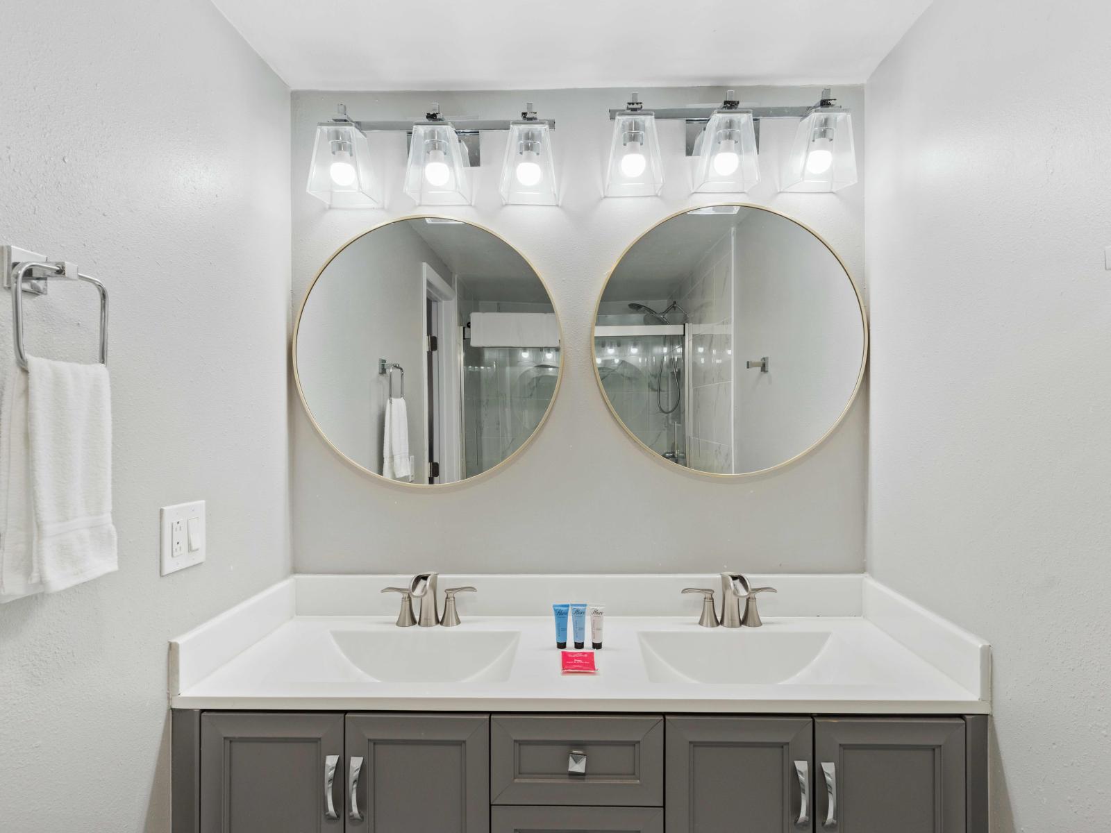 Bathroom 1 with double vanity and walk-in shower