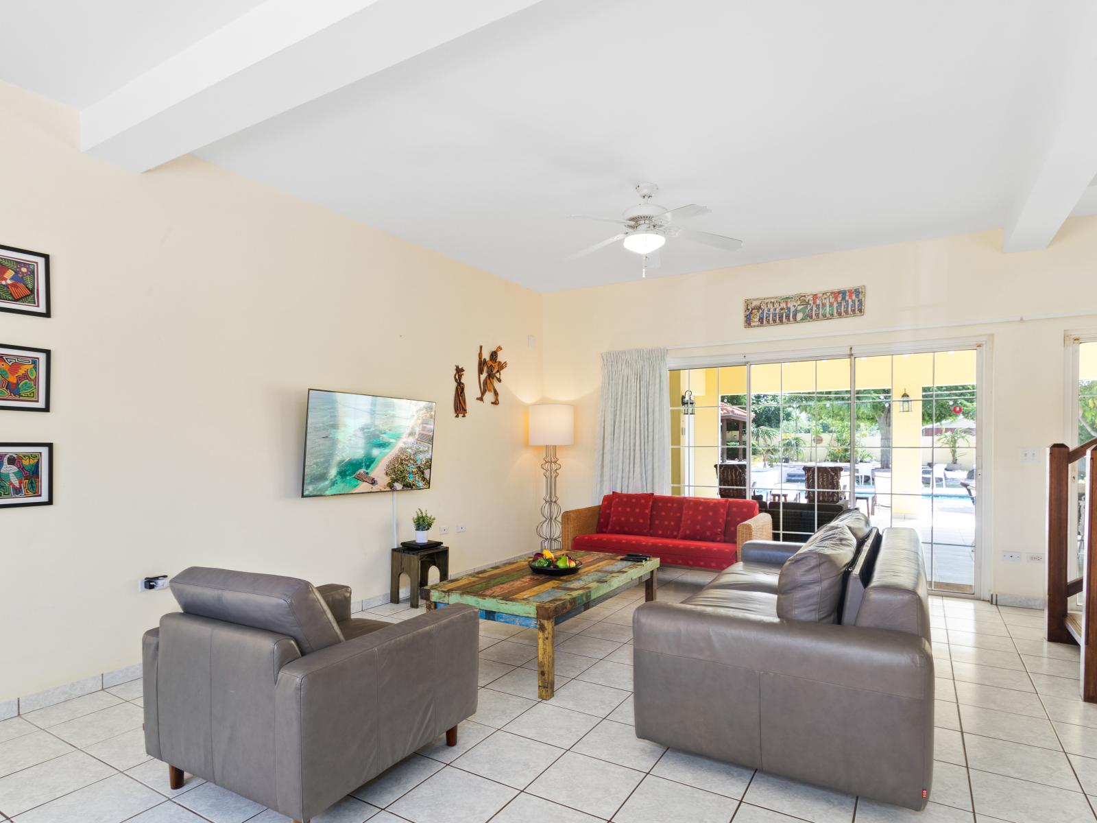 Elegant Living Area of the home in Noord Aruba - Smart TV and Netflix - Stylish furniture and comfy sofas - Well-chosen lighting fixtures adding both functionality and charm