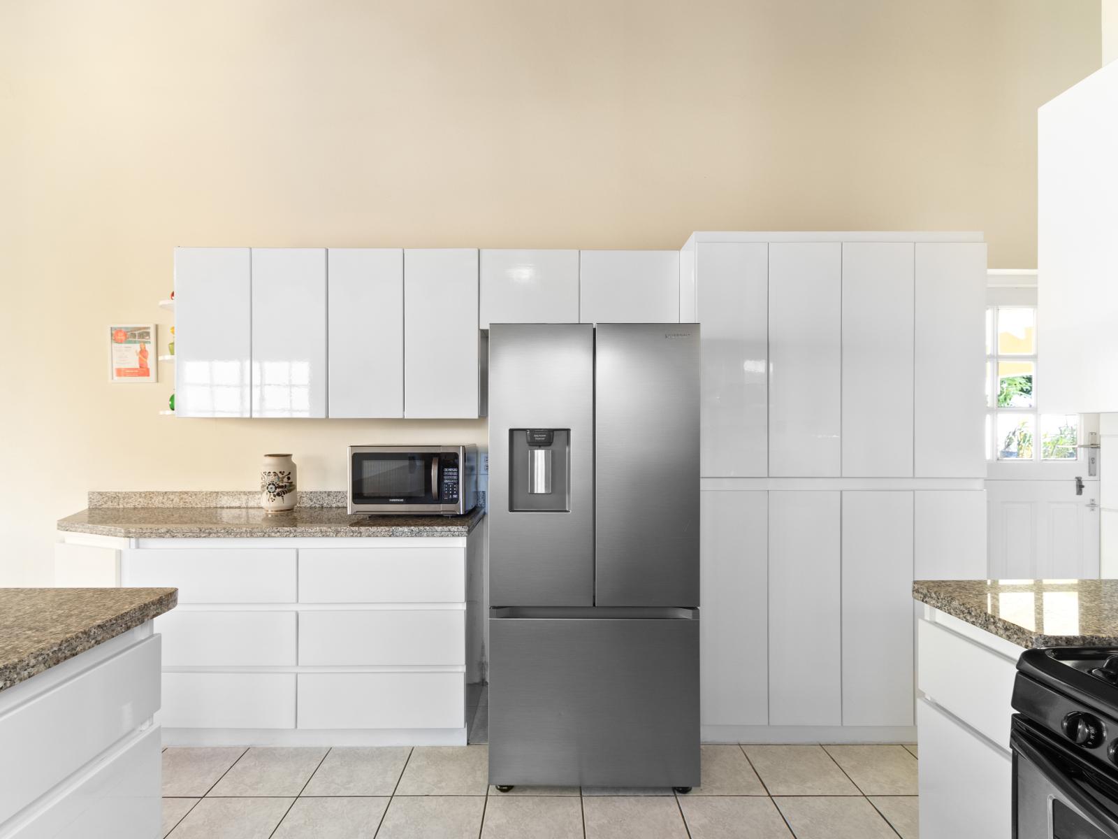 Modern Kitchen of the home in Noord Aruba - Stainless steel appliances - Plenty of storage space - Thoughtful placement of kitchen essentials for easy access