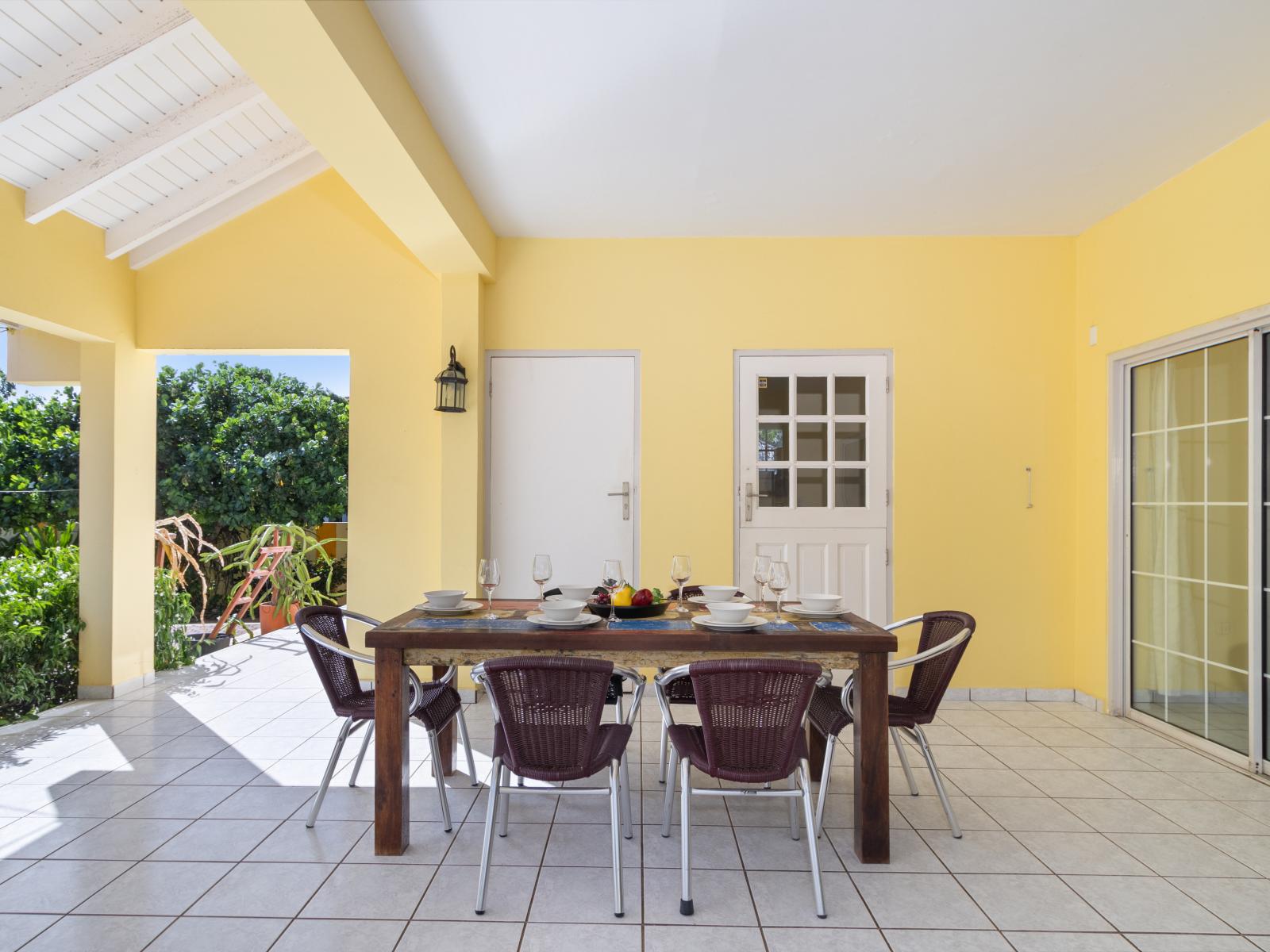 Fabulous Outdoor Dining Area of the home in Noord Aruba - Al fresco elegance: where every bite comes with a side of fresh air. - Savor the sunsets and culinary delights in the charm of the outdoor dining area