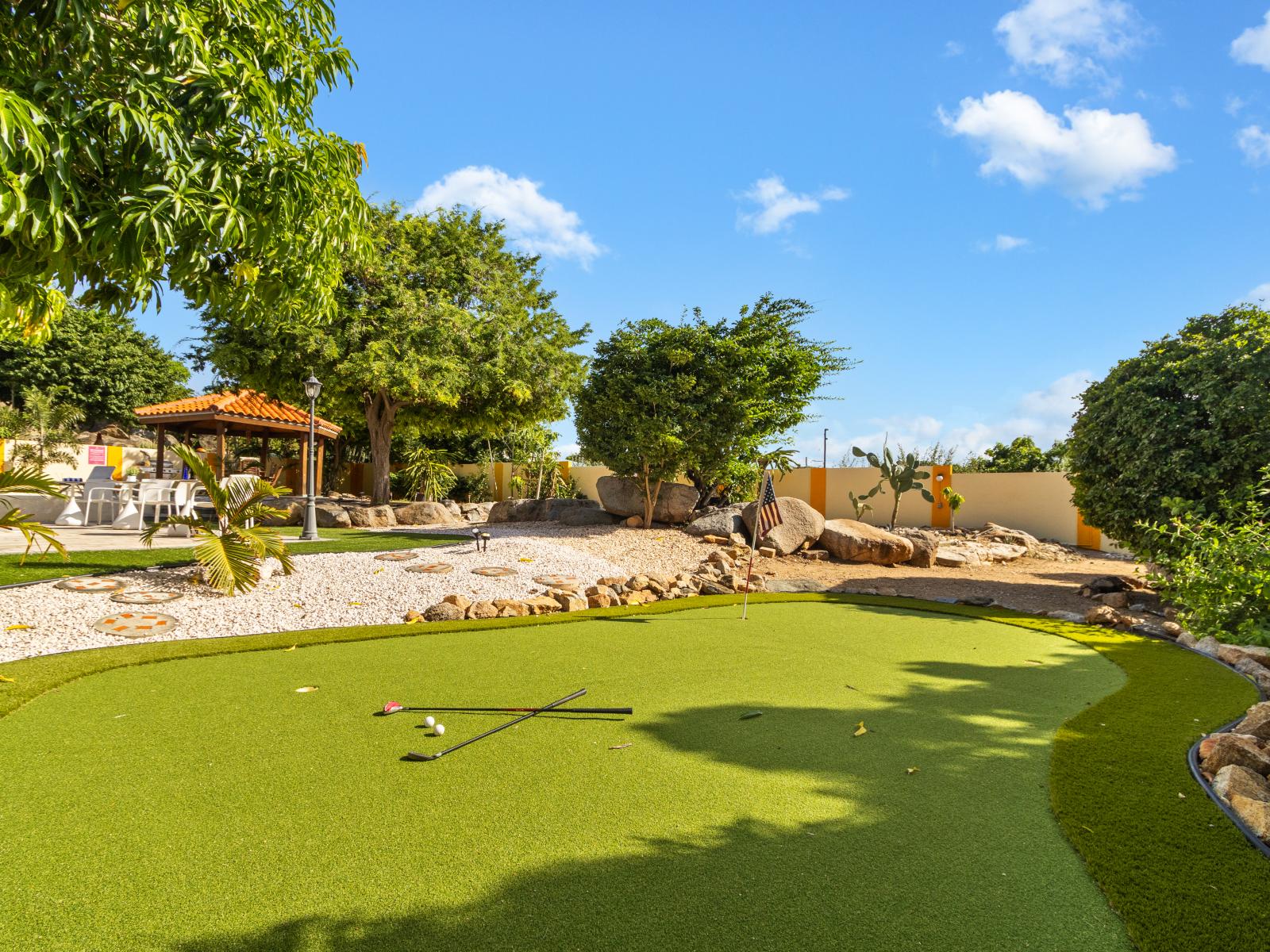 Unlock your inner golf pro with our backyard mini golf course, designed for all ages to enjoy.