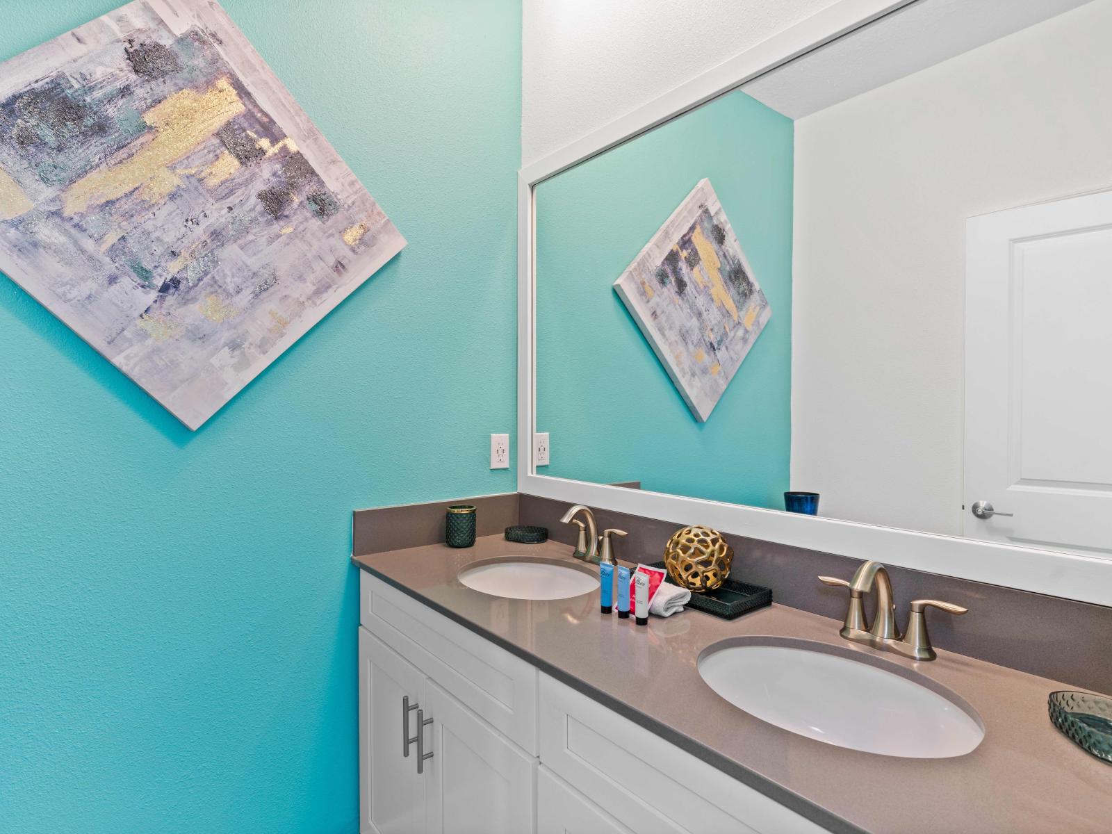 Bathroom 1 boasts a spacious walk-in shower, offering both convenience and modern elegance.