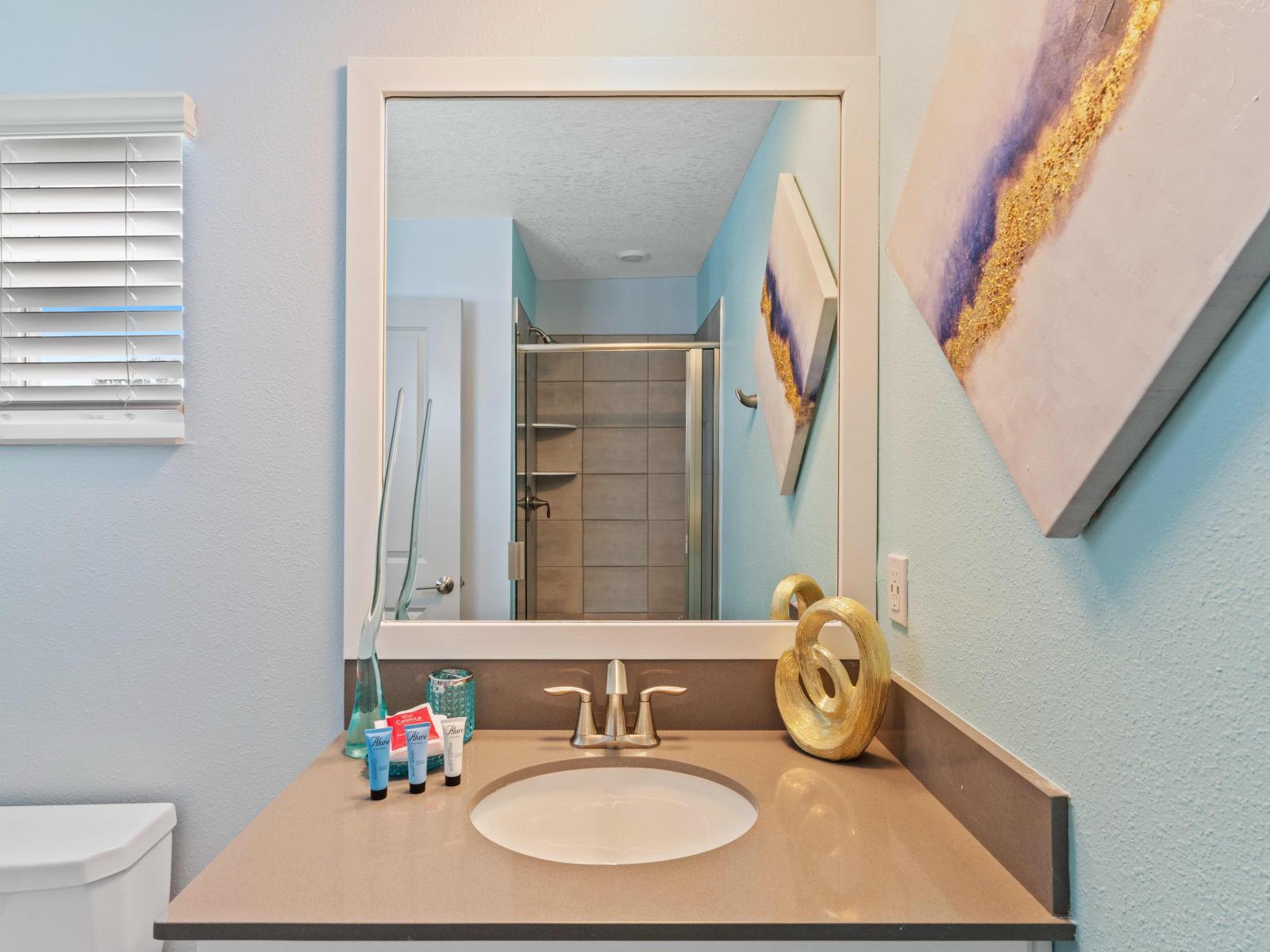 Enjoy the convenience of Bathroom 4's sleek walk-in shower, combining modern style with comfort.