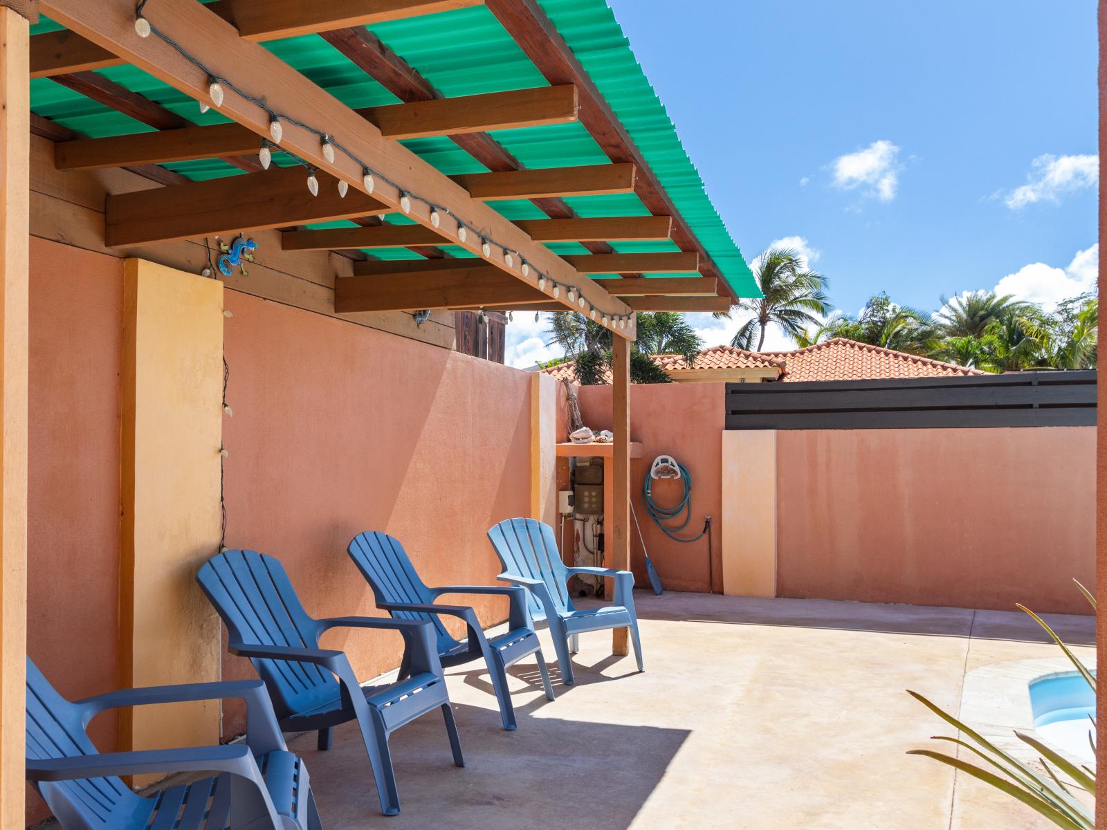 Amazing pool area of the 3BR House in Noord Aruba - Shaded pool lounging for sensitive guests - Experience ultimate relaxation in poolside paradise - Crystal-clear pool for refreshing dips