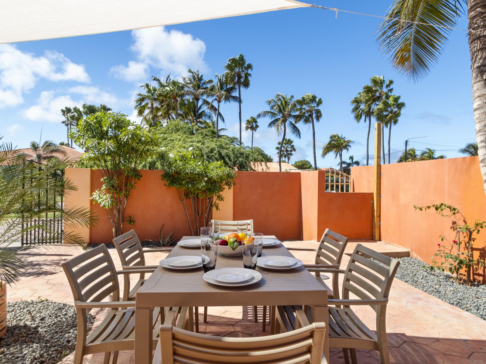 Elegant Outdoor dining area of the 3BR House in Noord Aruba - Gather 'round for al fresco feasts! - Share delicious meals  - create cherished memories