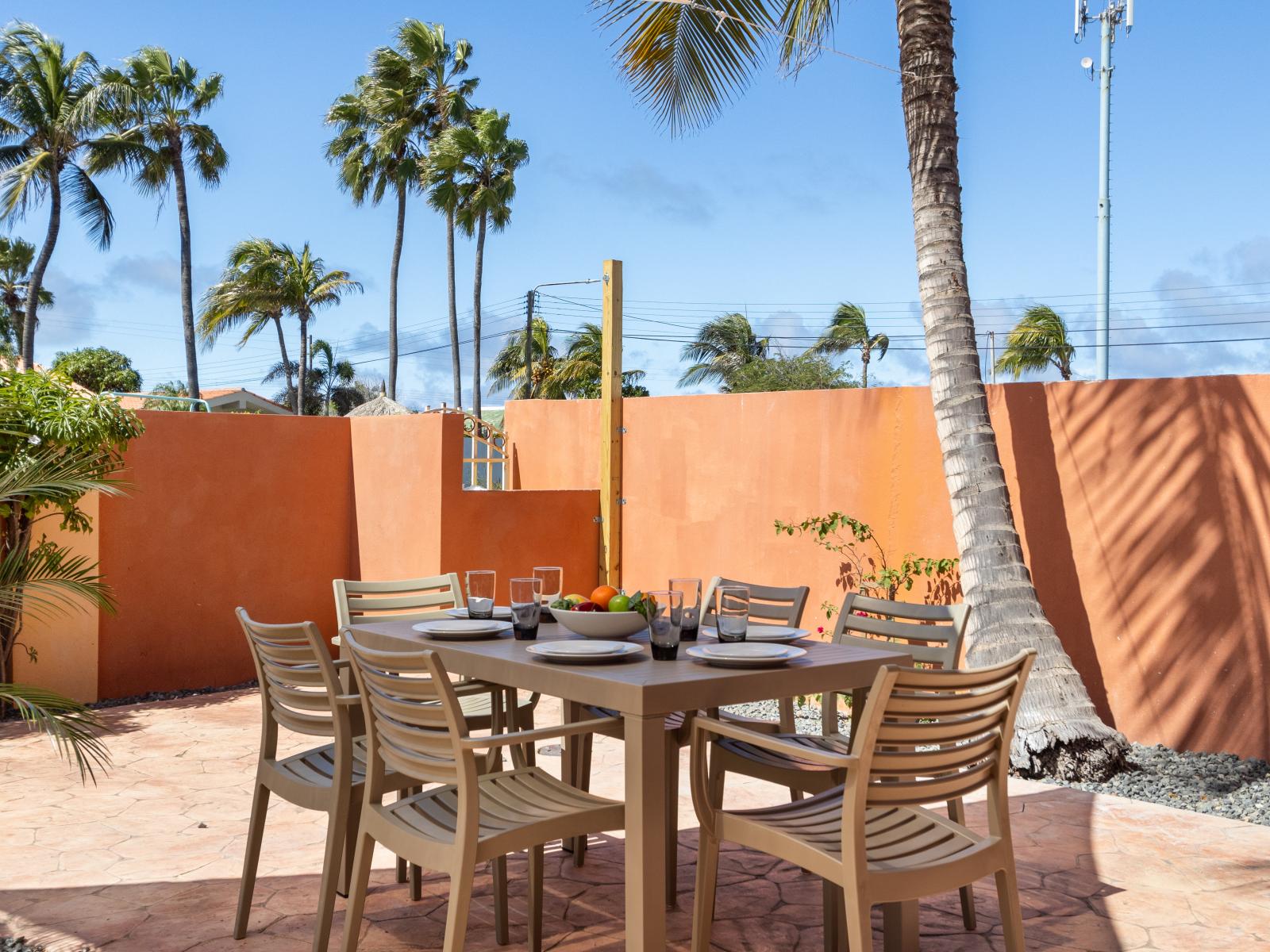 Savor the flavors of paradise with a side of poolside serenity - Outdoor dining experience offers a feast for the senses - Every meal accompanied by stunning views