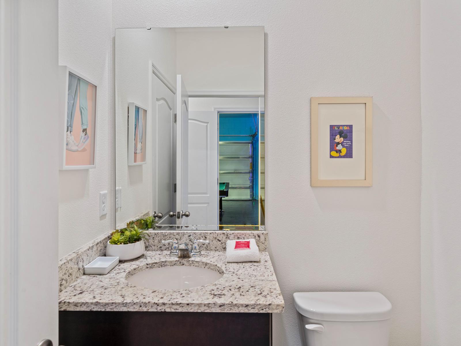 Essential half bathroom, providing extra convenience for your stay.