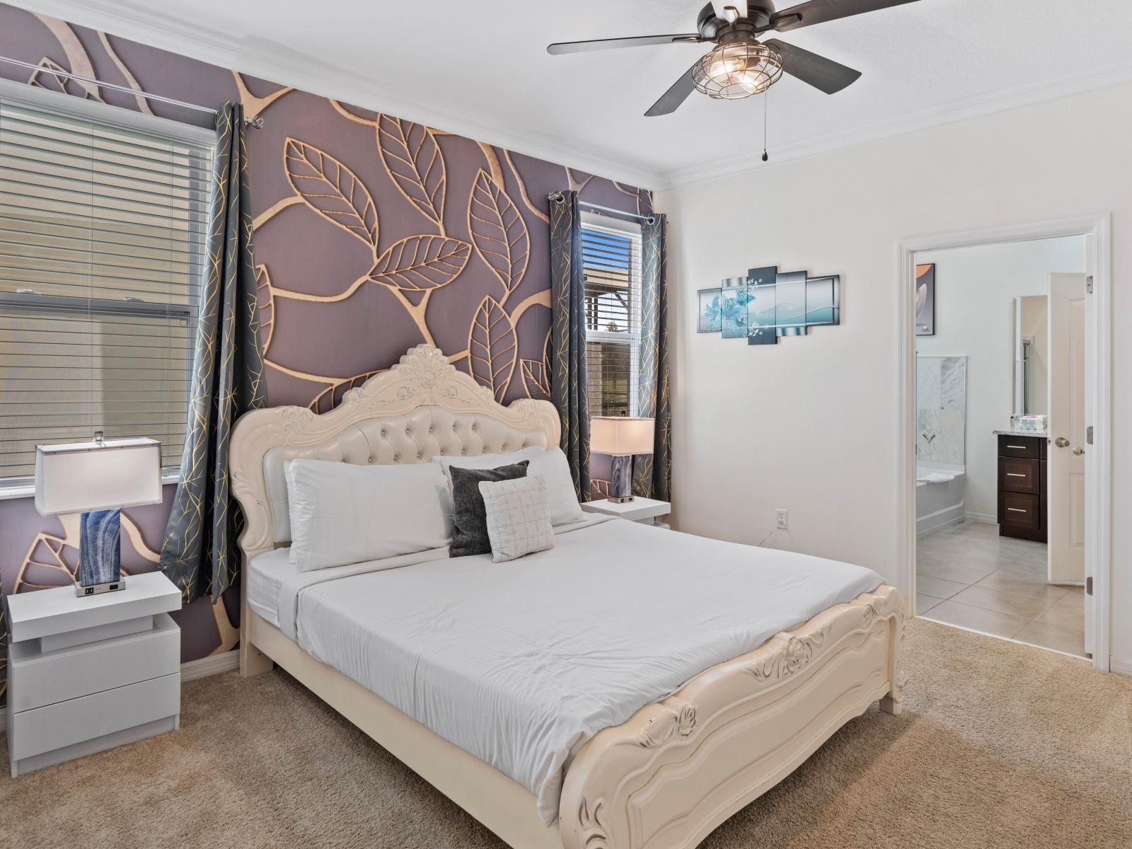 Enjoy the tranquility of Bedroom 2, offering a king-size bed and private bathroom, ensuring a peaceful retreat.