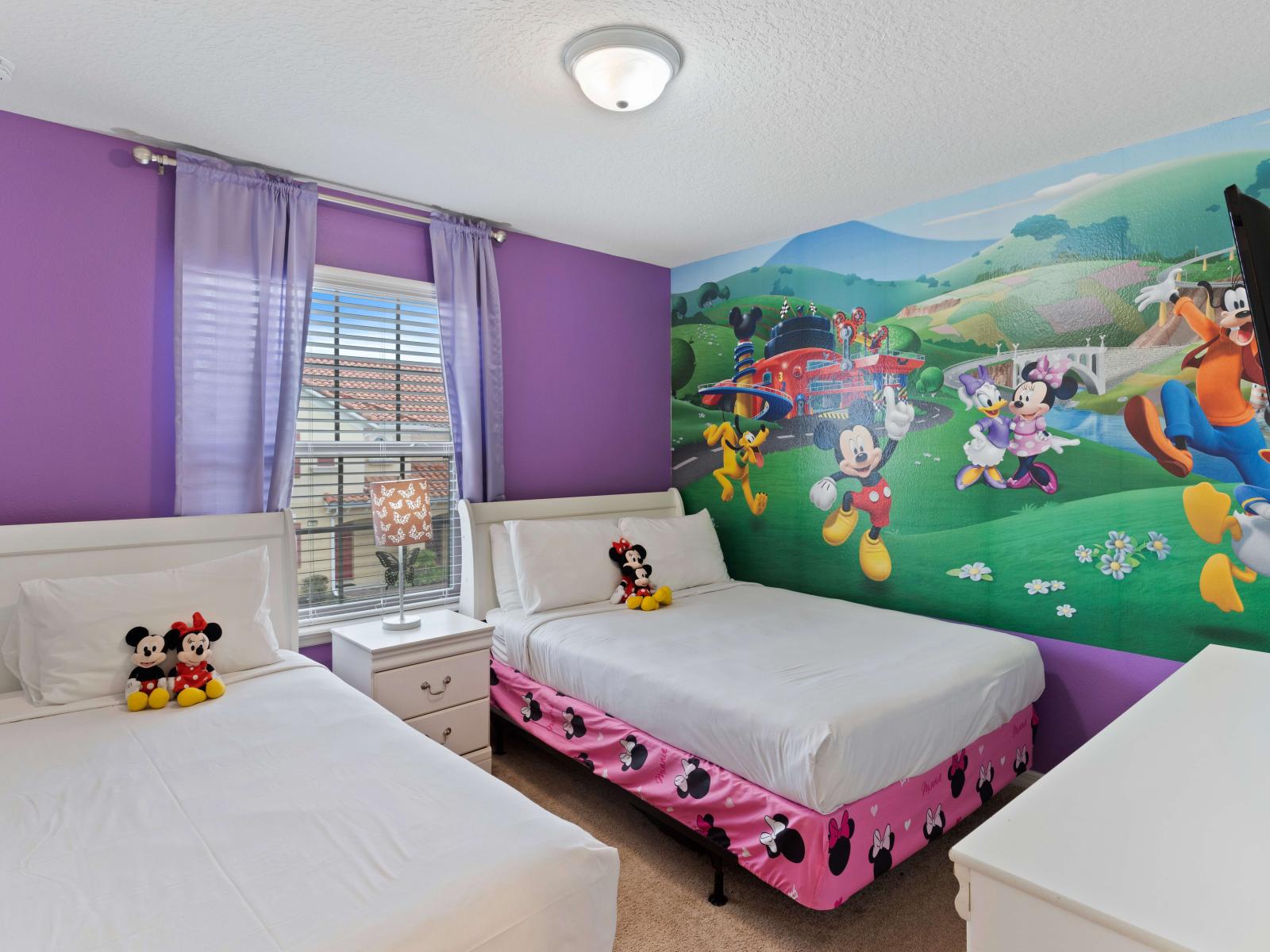 A playful bedroom for two, comfortable beds perfect for kids you will bring