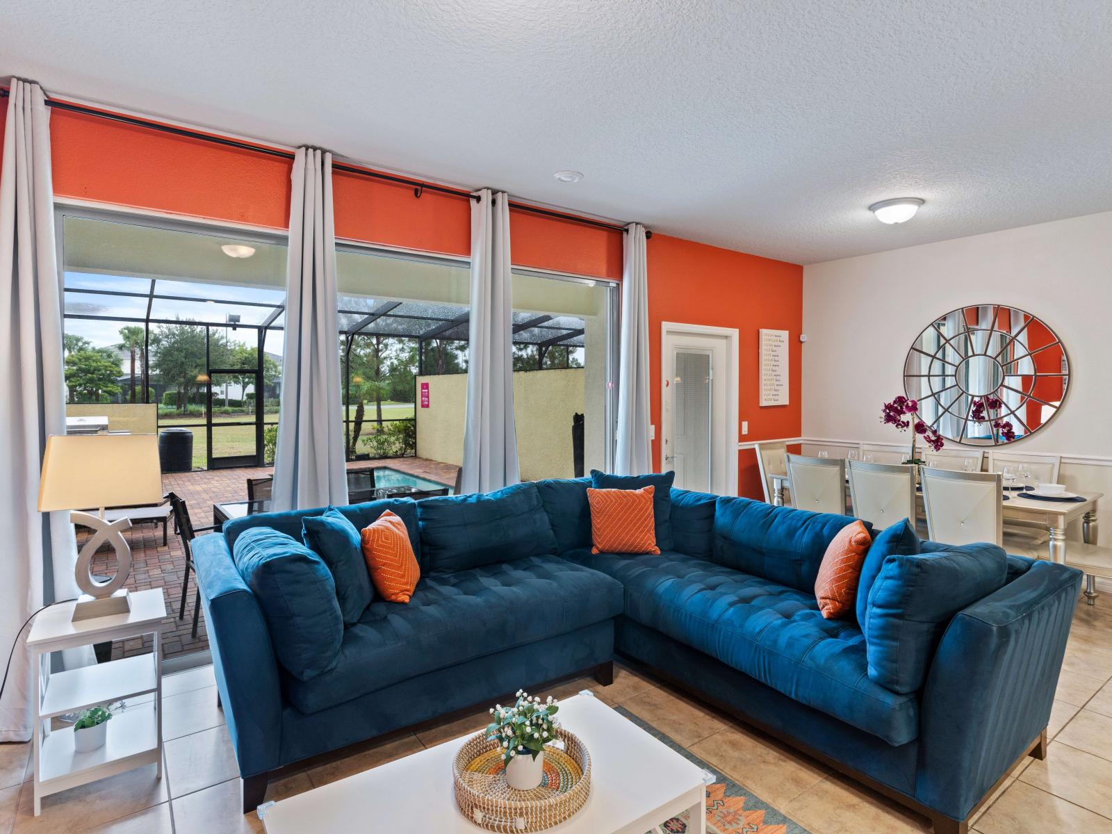 Embrace a colorful and playful vibe in our living room that promises endless entertainment. With ample seating, it's the perfect spot for shows, movies, games, and more, plus easy access to the pool.