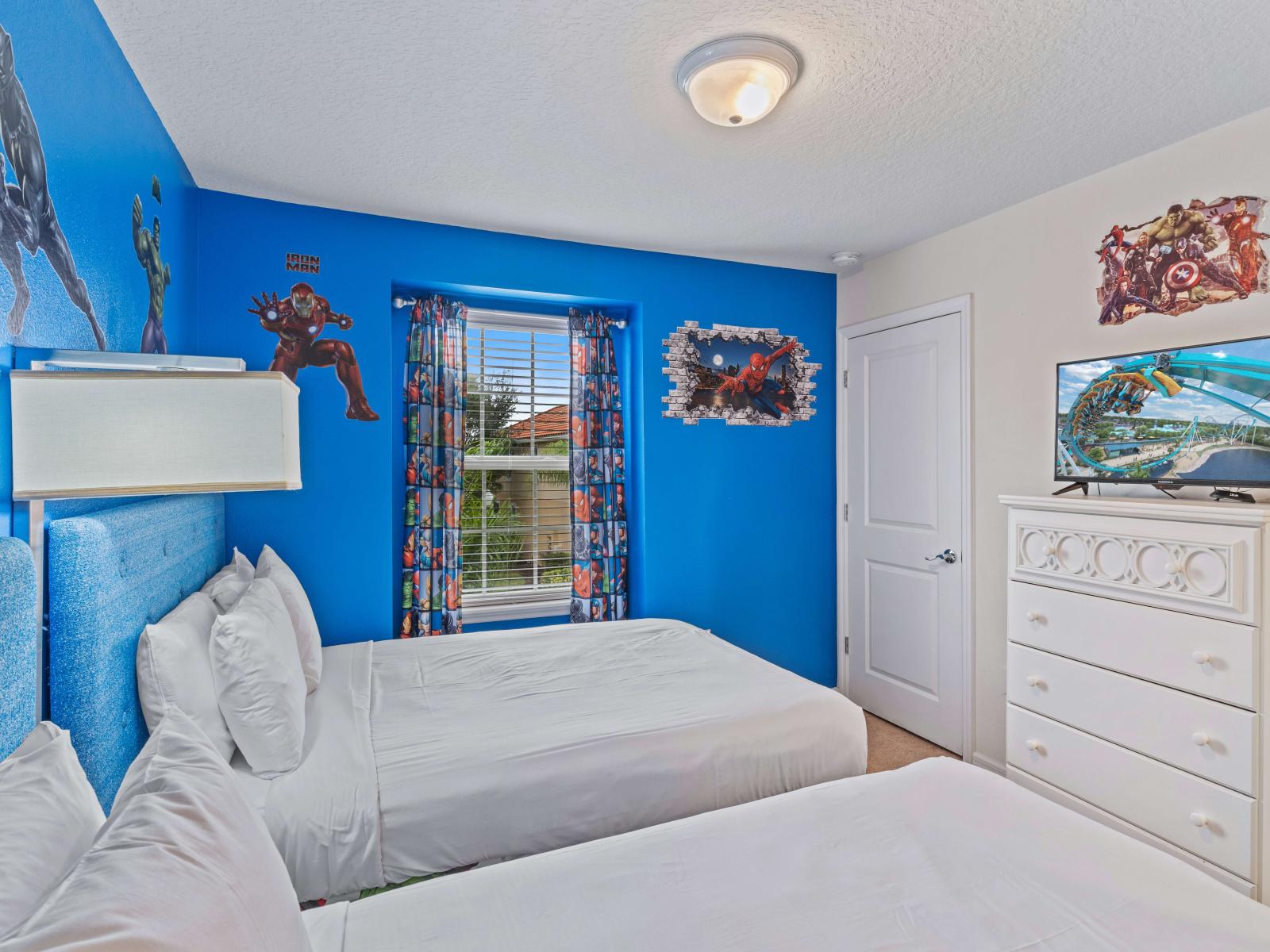 Relax in Bedroom 2's cozy ambiance, featuring both a double bed and a single bed for comfortable accommodations.