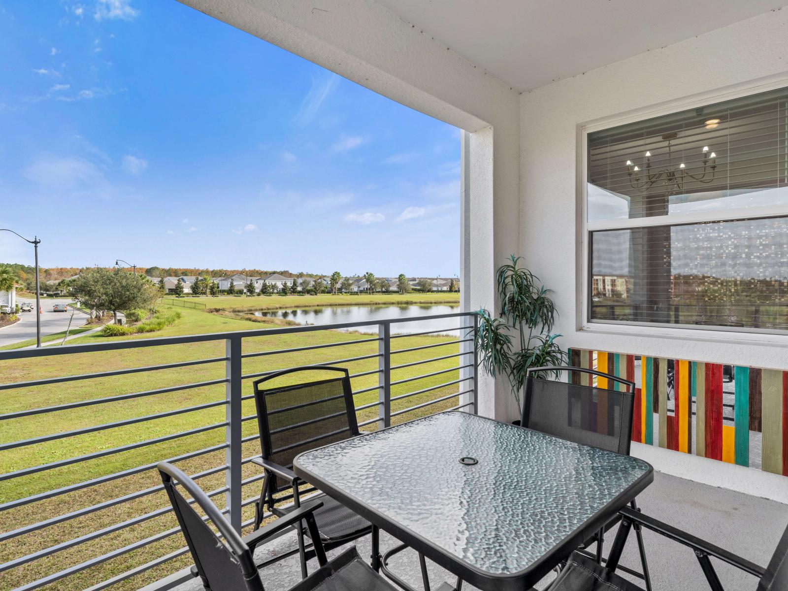 Balcony area with outdoor dining