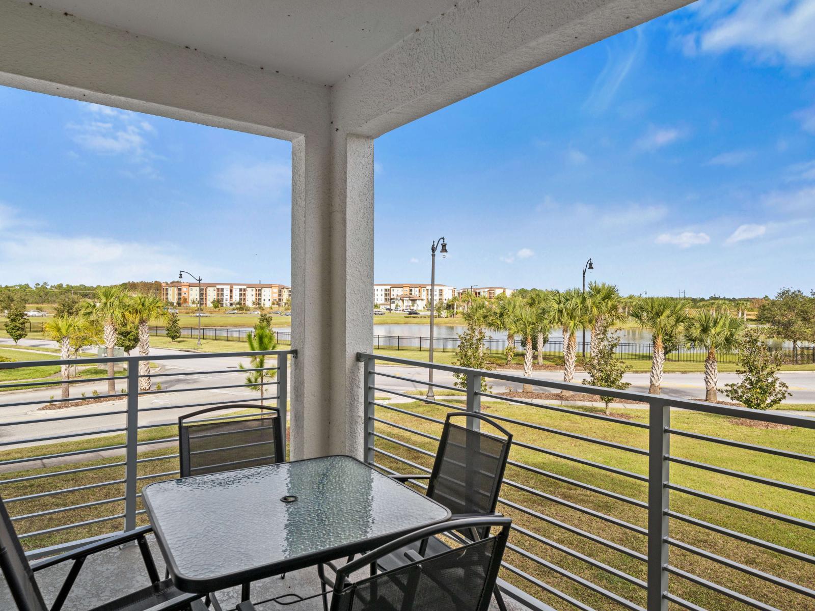 Balcony area with outdoor dining