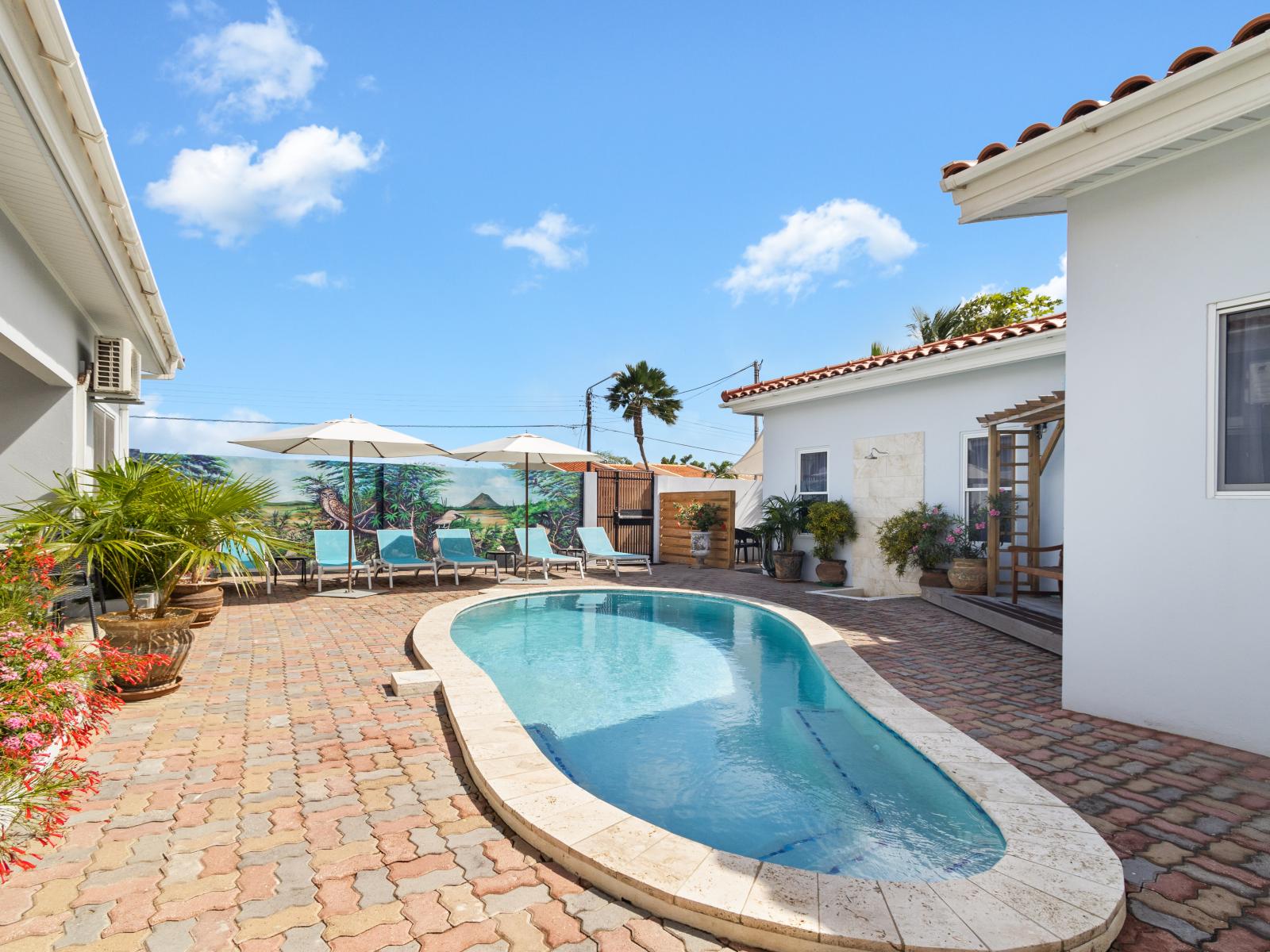 Community Pool Area- its always refreshing to swim in the pool or lie down on the chair to get a tan