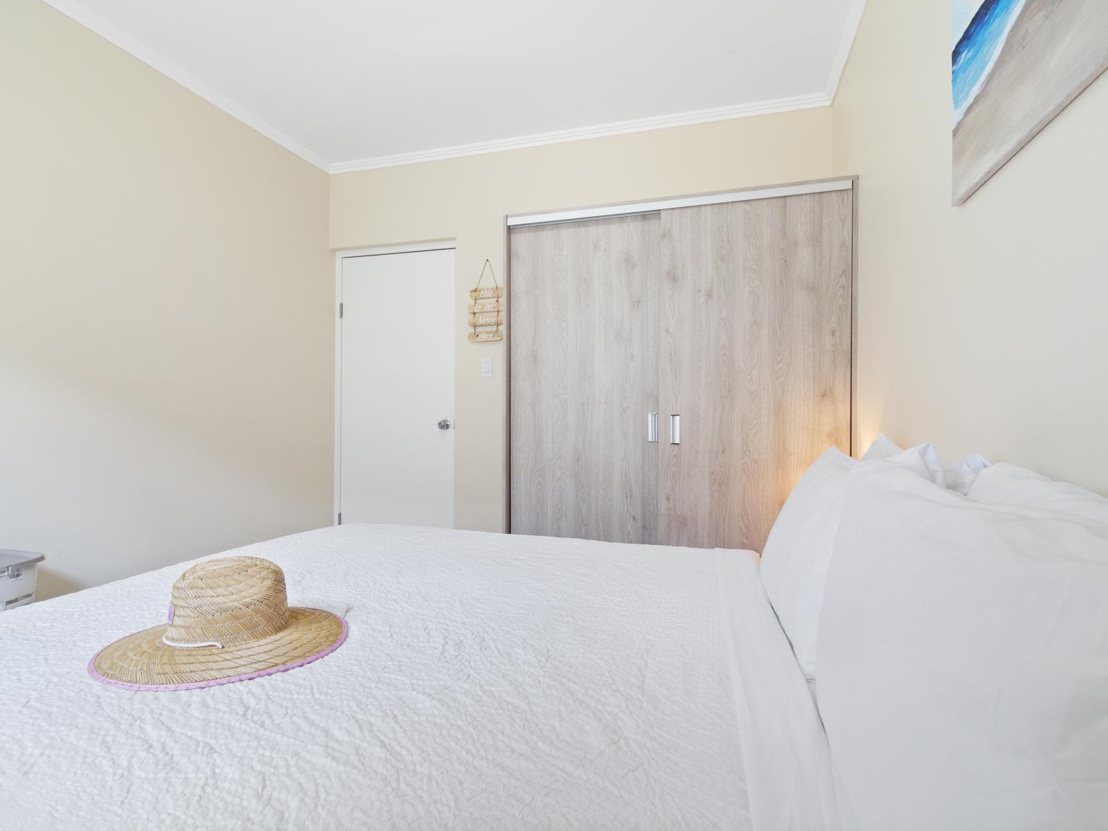 Splendiferous Bedroom of the apartment in Noord Aruba - Queen Size comfy Bed - Spacious bedroom offering comfort and style - Modern and stylish arrangement that complements the space