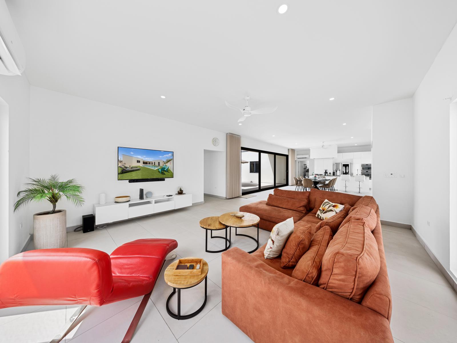 Well-designed living area of the home  in Noord, Aruba - Enjoy the comfy arrangement of sofas for your utmost comfort - Elegantly decorated space providing a refreshing ambiance - Availability of smart TV and Netflix  for entertainment