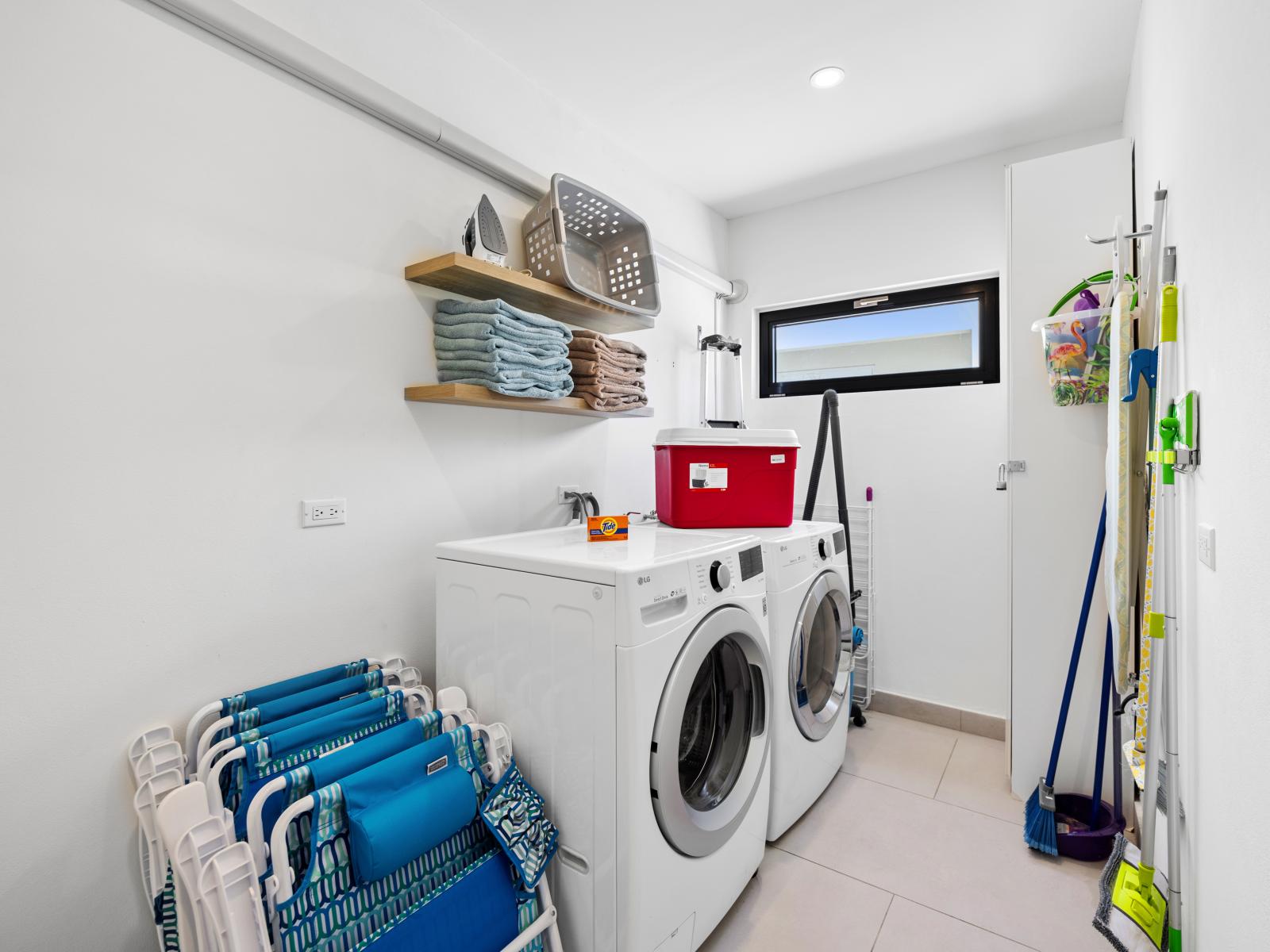 Experience the convenience of our fully equipped laundry room with washer and dryer. - Keep your clothes fresh and ready for any adventure with our laundry facilities - Feel at ease with access to our convenient laundry room during your stay.