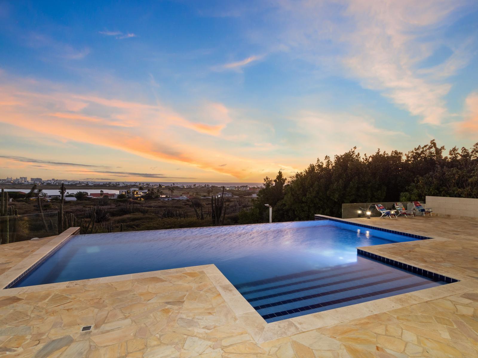 Dive into paradise! Our infinity pool offers more than just a swim; it's a gateway to breathtaking island views that stretch to the horizon.