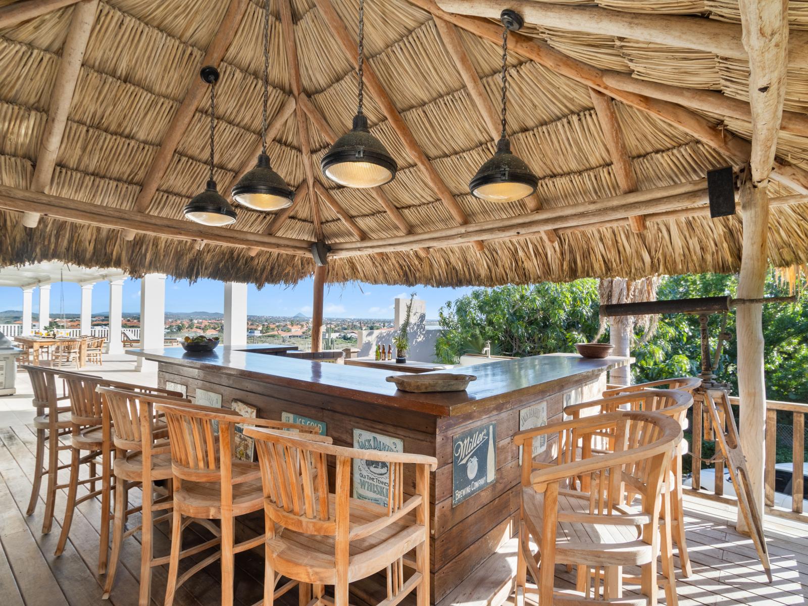 Sip, savor, and soak in paradise at our private poolside Tiki bar. It's more than just a spot for drinks; it's a retreat where every moment is infused with island vibes and relaxation.