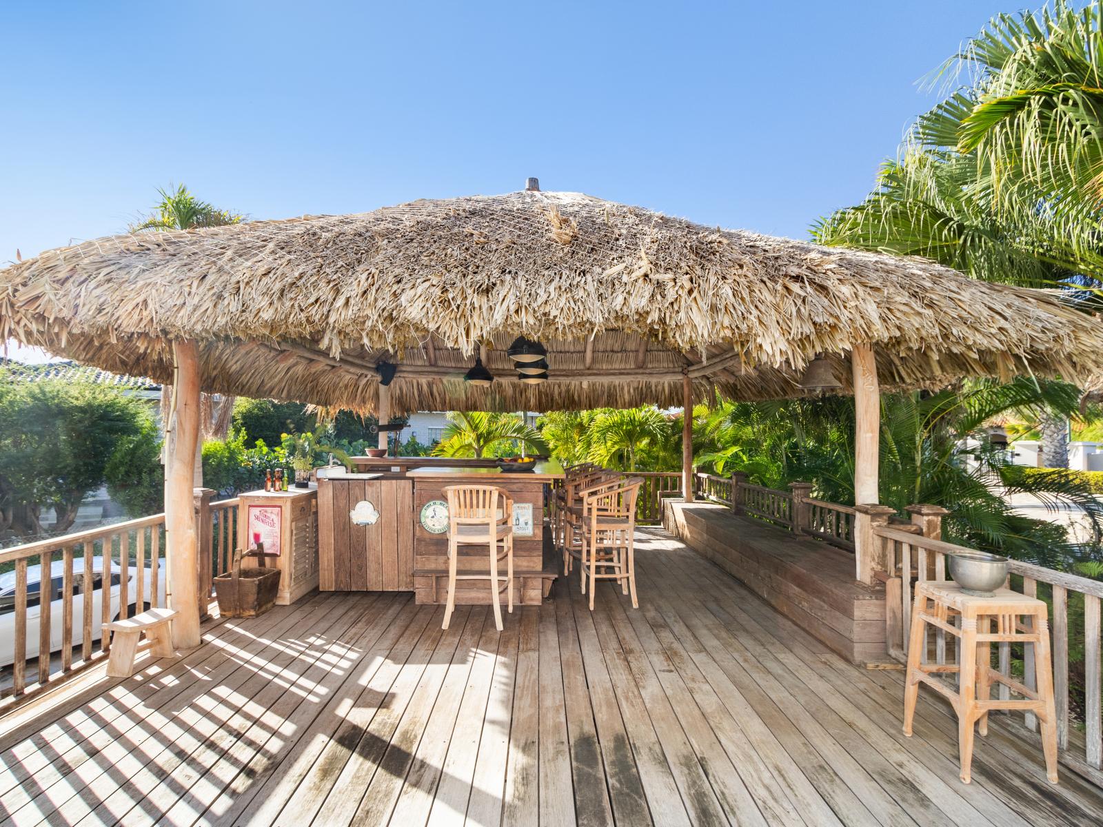 Indulge in island vibes with your very own private Tiki bar. It's not just a spot for drinks; it's a slice of paradise where every sip is a taste of relaxation and luxury.