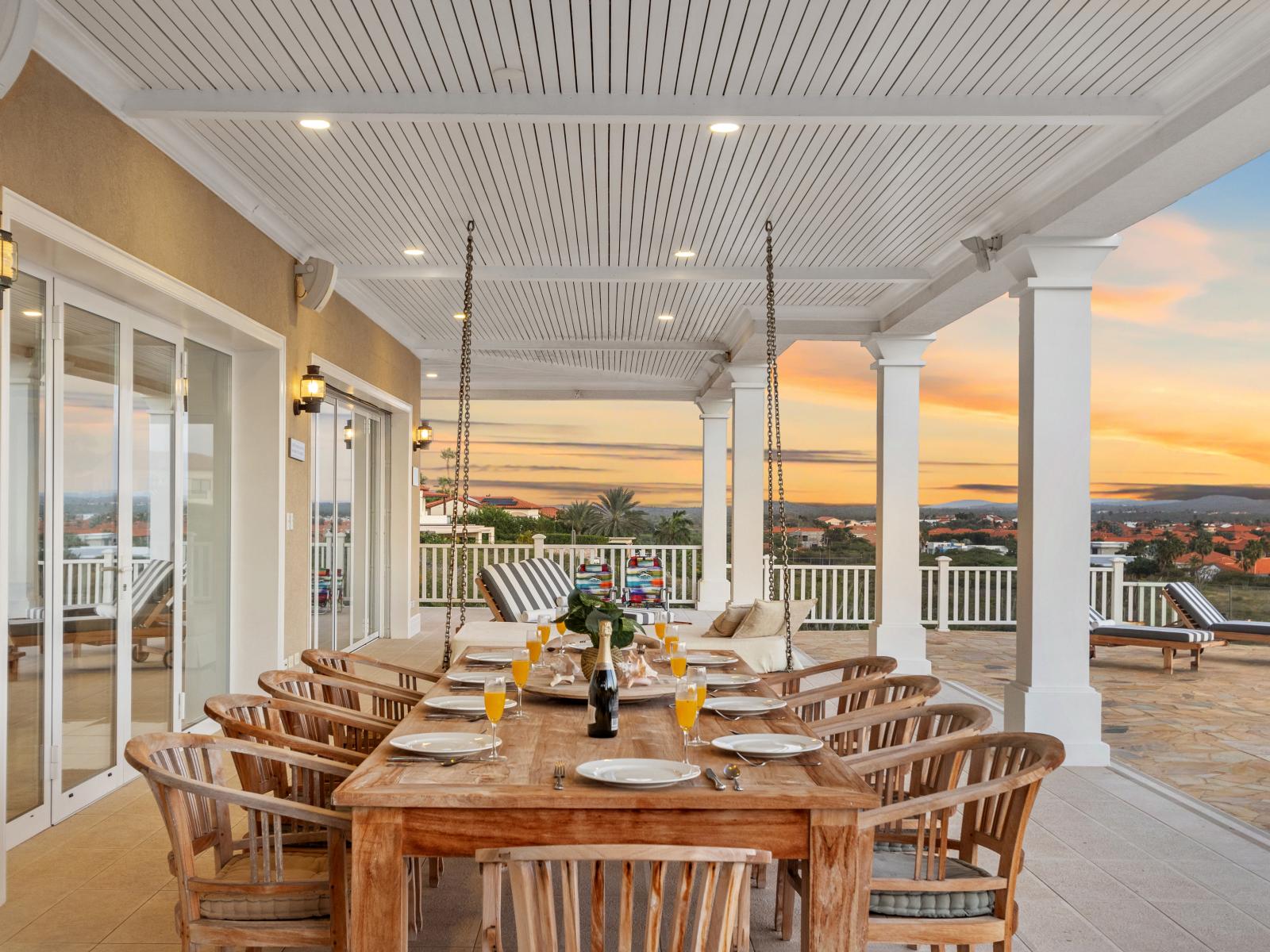 Gather 'round our spacious dining table, where every seat invites connection and every meal becomes a feast under the open sky. Perfect for outdoor dining on the patio with room for everyone.