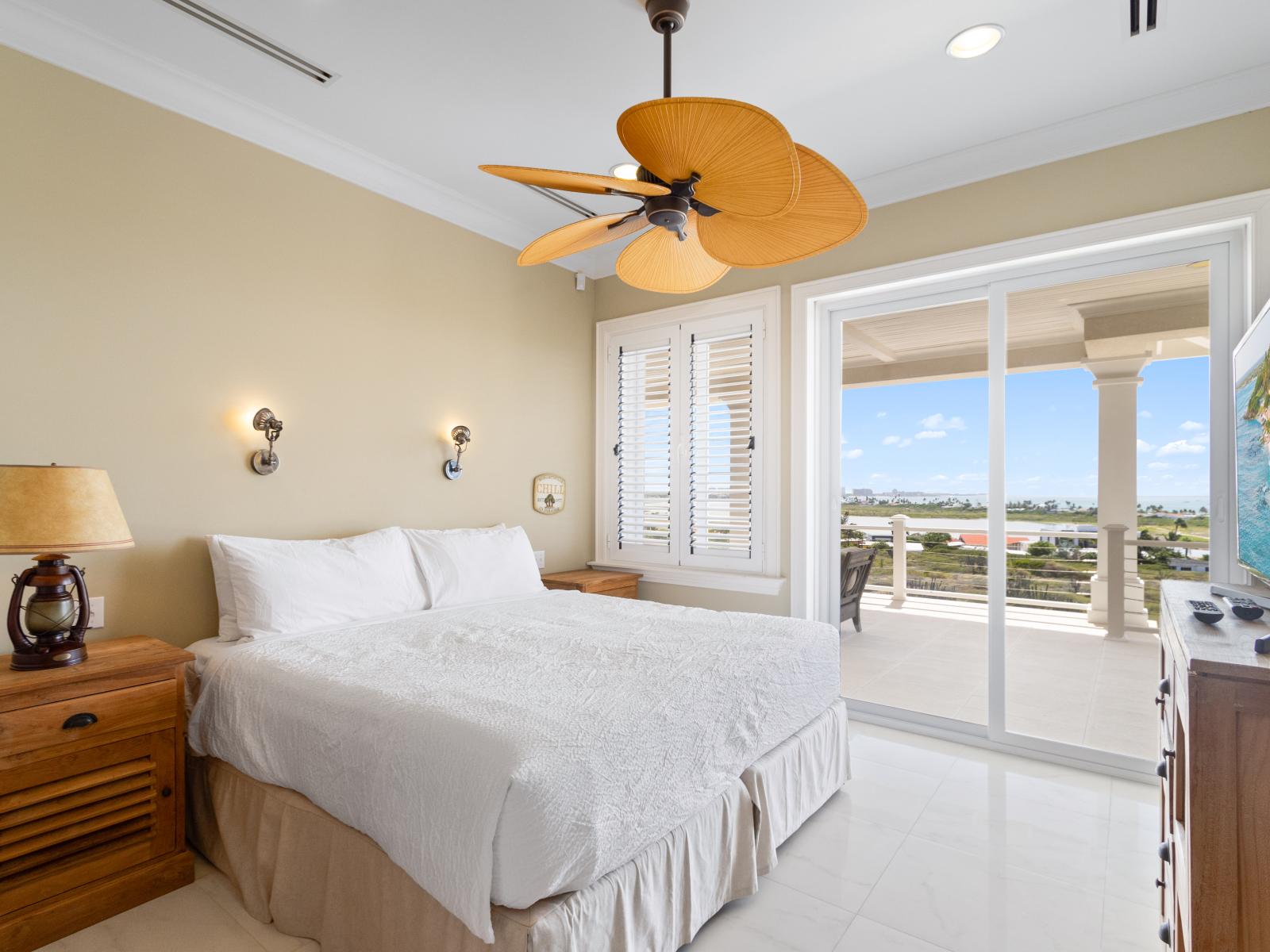 Indulge in the ultimate beachfront escape in our second-floor bedroom, featuring a spacious ensuite bathroom and a balcony with mesmerizing ocean views.