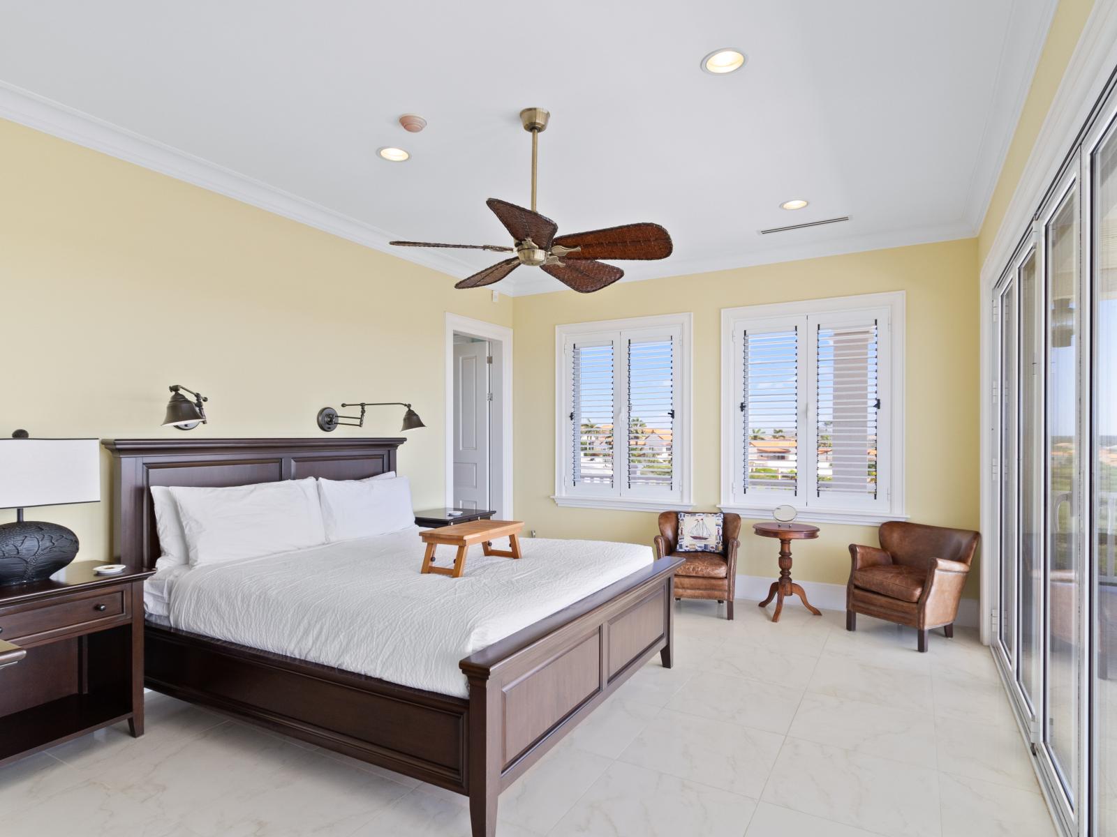 Upstairs Main Bedroom 5 boasts a luxurious king-size bed for ultimate comfort.