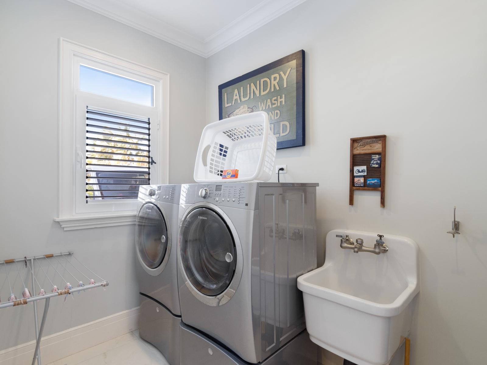 Enjoy the convenience of a modern laundry room equipped with washer and dryer facilities during your stay.