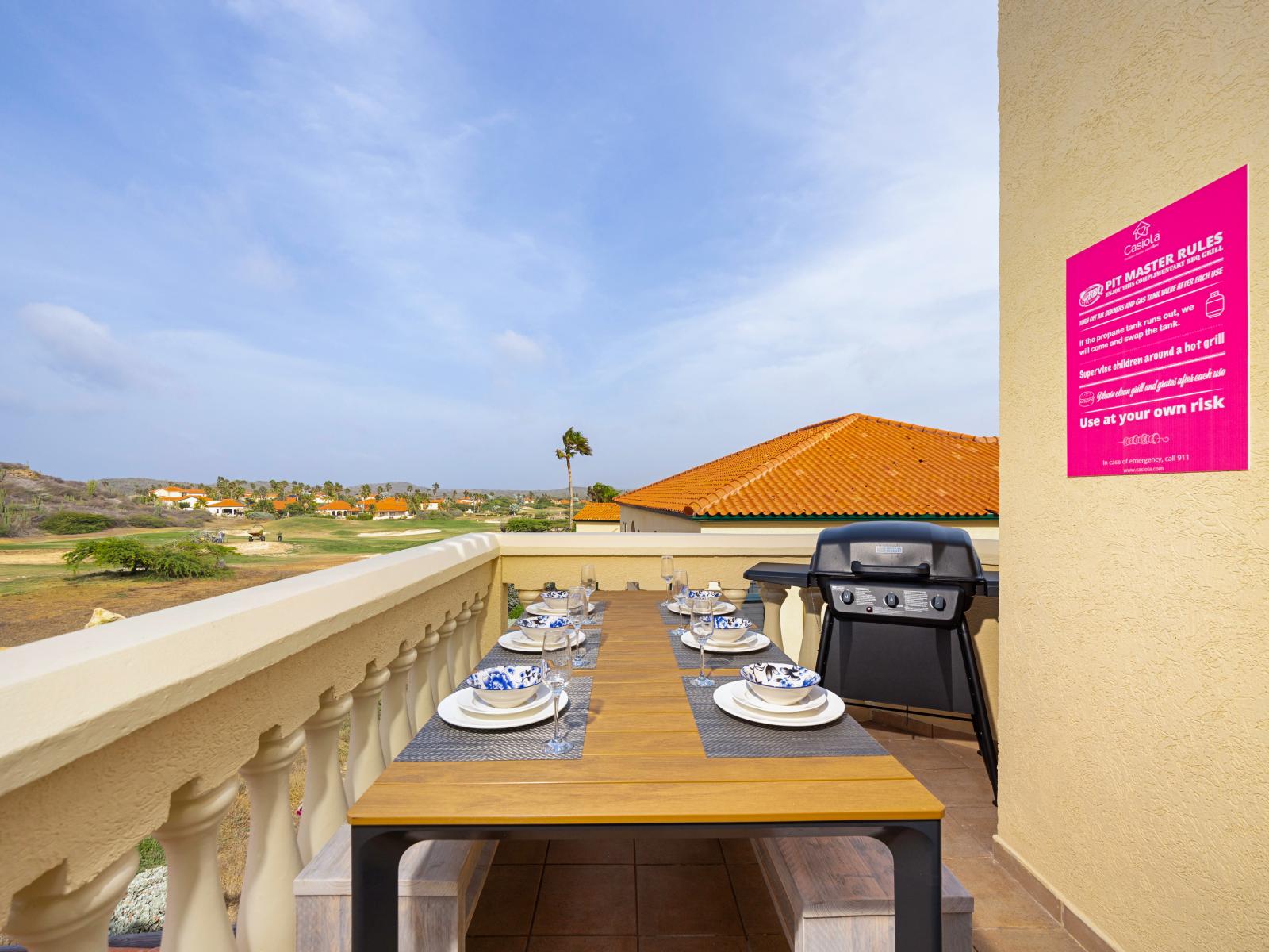 Stunning private balcony of the condo in Noord Aruba - Offers dining table and BBQ Grill - Alfresco elegance awaits under the open sky - Every meal becomes a breath of fresh air - Elevate your dining experience amidst the amazing views