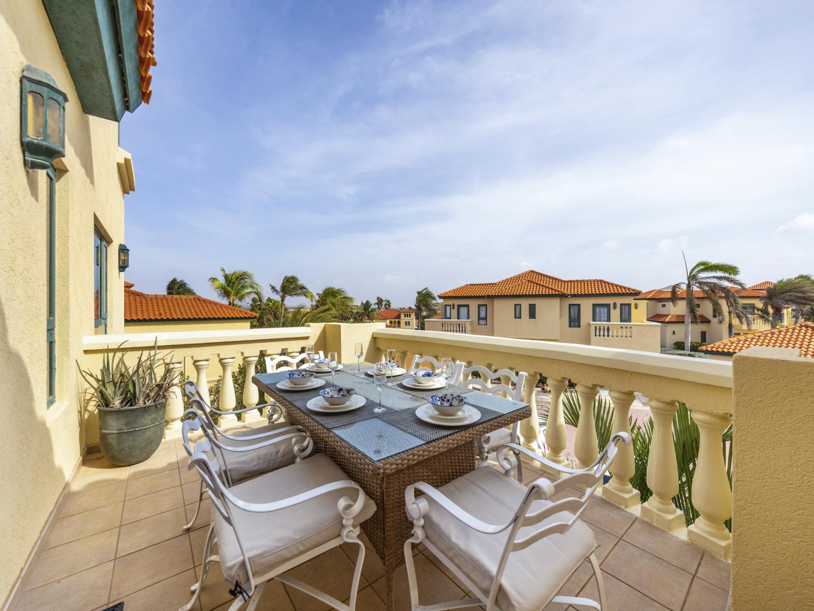 Amazing outdoor dining area of the condo in Noord Aruba - Attached to bedroom with breathtaking views - Unwind in outdoor haven, where every meal is a breeze