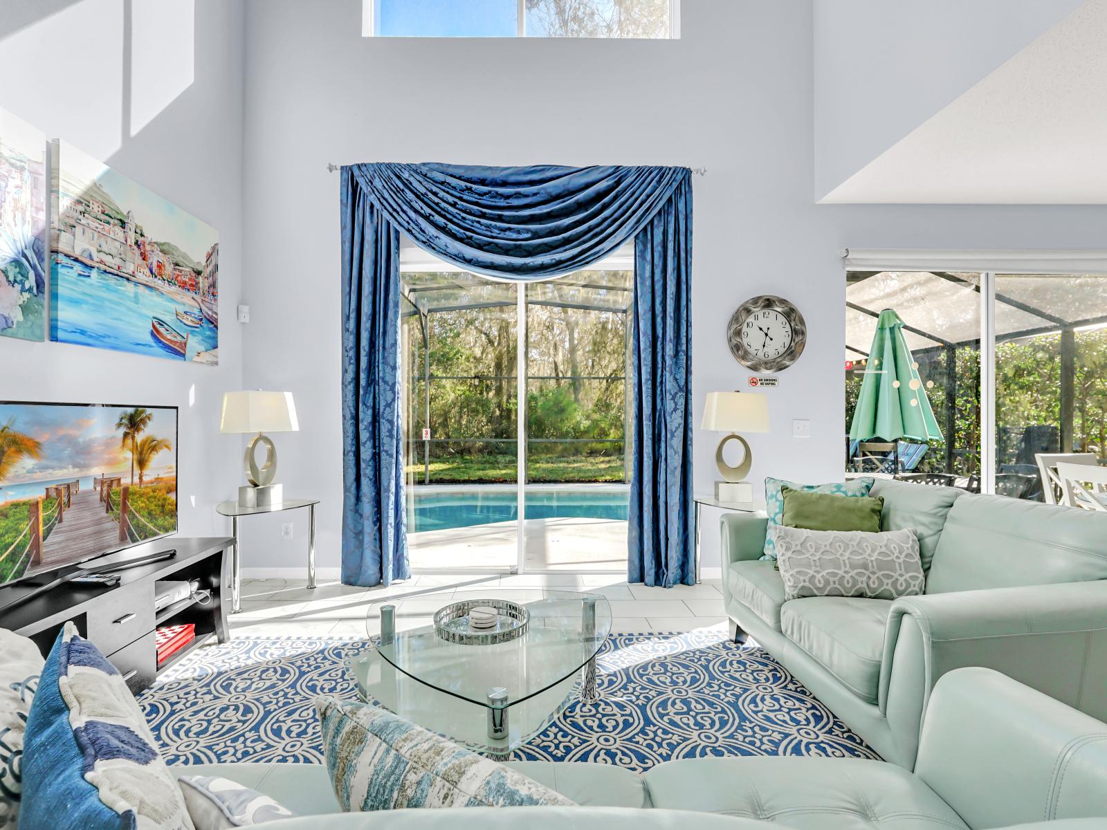 Spacious Living Area of the Home in Kissimmee Florida - Step into the Living Area with a Sliding Door Opening to the Poolside Bliss - Smart TV and Netflix - Comfy Sofas