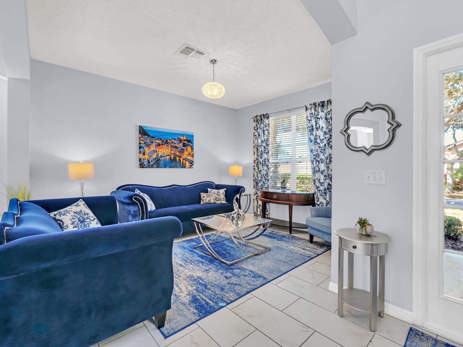 Lavish Bedroom of the Home in Kissimmee Florida - Spacious serenity unfolds in our grand living Area - Plush sofas - Your haven for relaxation in style  - Smart TV and Netflix