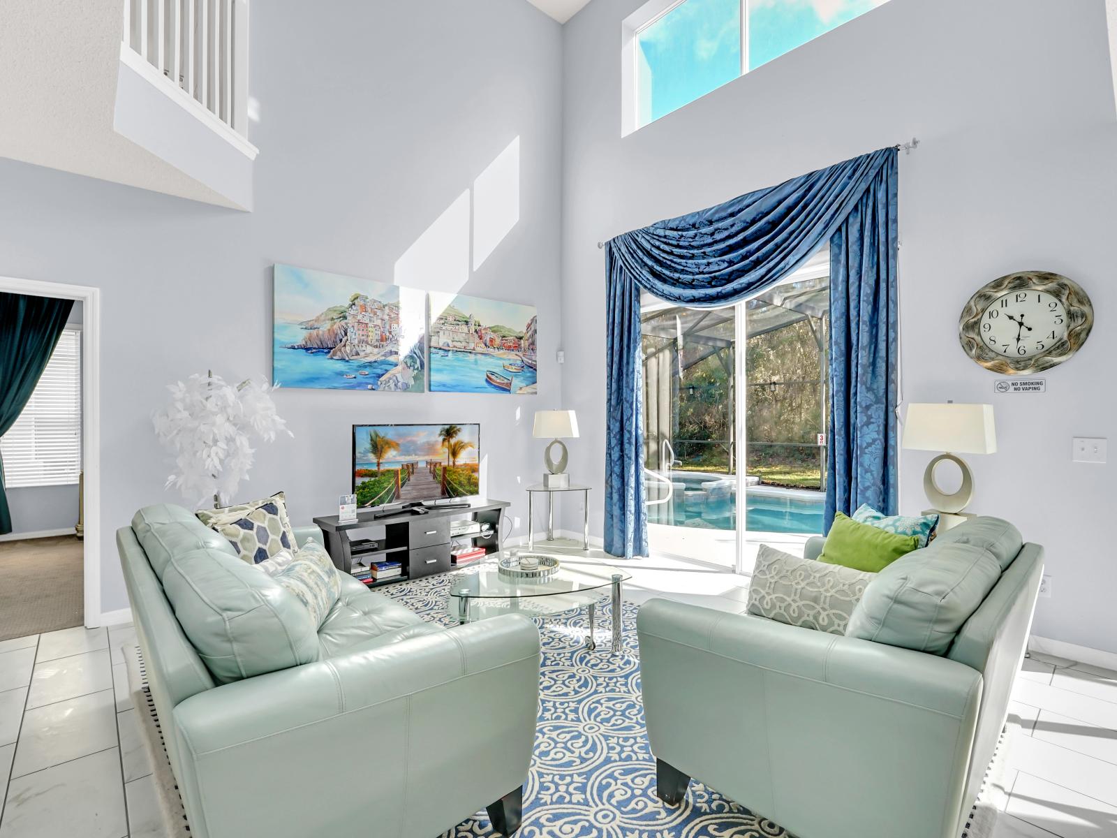 Magnificent Living Area of the Home in Kissimmee Florida - Dive into Tranquility in living area oasis with chic Blue Accents - Smart TV and Netflix - Harmonious color scheme with pops of accent colors for visual interest