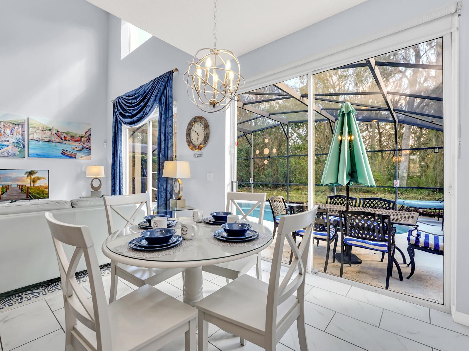 Stunning Home in Kissimmee Florida - Breakfast Area Overlooks the Private Pool - Creating a Serene Setting for Your Day - With its elegant decor and comfortable seating