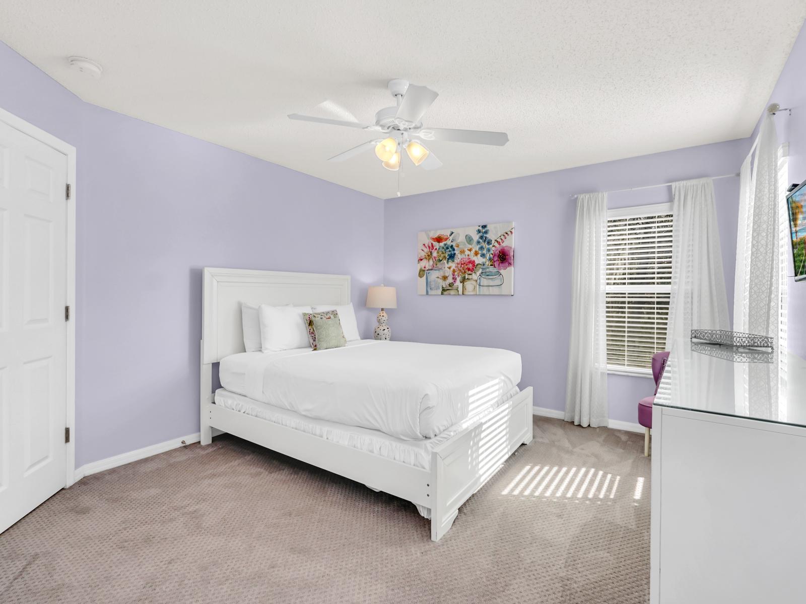 Relaxing Bedroom of the Home in Kissimmee Florida - Relax in Comfort and Style  - A Queen Size Bed and Private Bathroom - Smart TV and Netflix - Enhanced by Dainty Painting for Added Charm