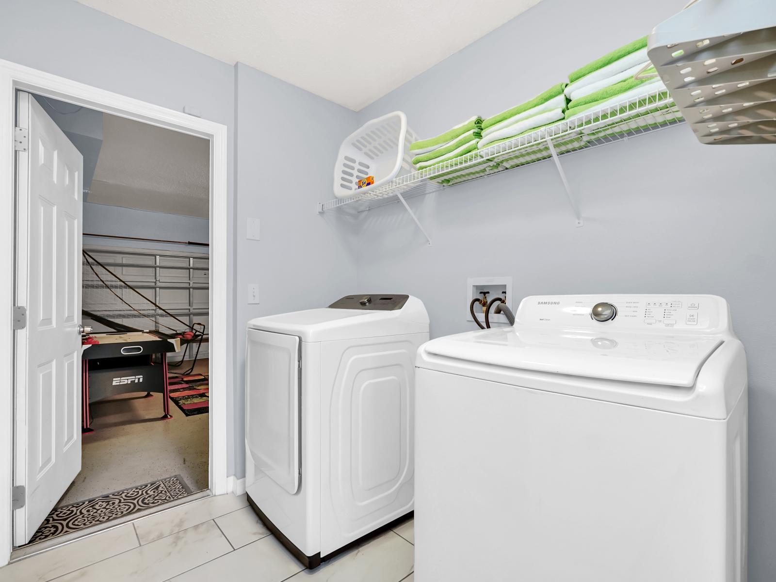 Laundry Area of the Home in Kissimmee Florida - Laundry area ensures that your clothes stay fresh and clean throughout your stay  - Thoughtful amenity for your comfort