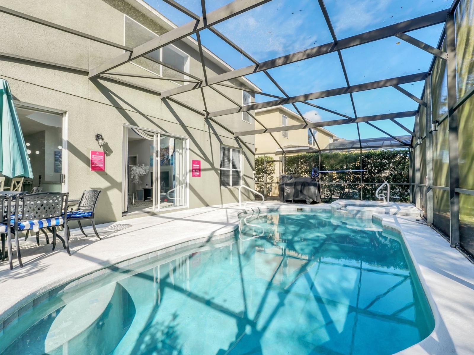 Outstanding Private Pool of the Home in Kissimmee Florida - Lush and refreshing environment - Cozy lounge chairs available - Beautifully sunbathed space makes the soul peaceful - Experience the comfort at the best