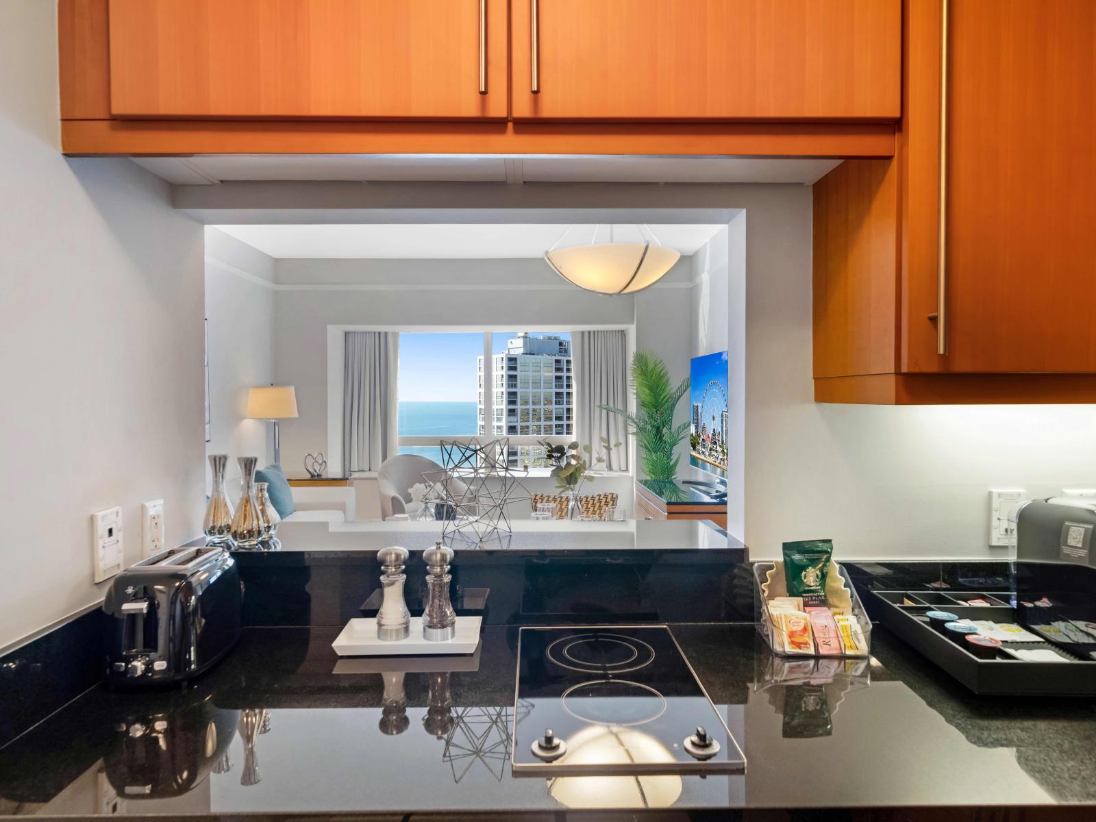 Modern Miami Kitchen Retreat: Step into this fully furnished kitchen, where modern design meets functionality. A stylish space that makes preparing meals a delight, ensuring your stay is as comfortable as it is luxurious.