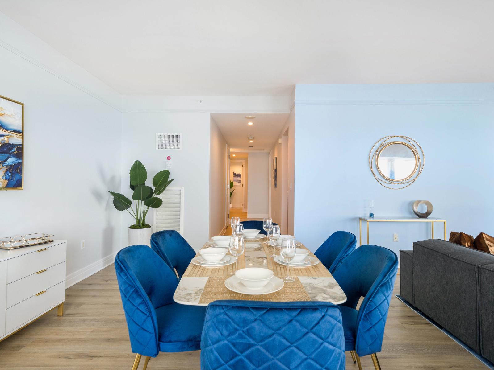 Elegant Dining Area of the Condo in Miami Florida - Chic dining area featuring a stylish table and contemporary seating - Sophisticated design with a blend of modern and classic elements - Dining for 6 Persons