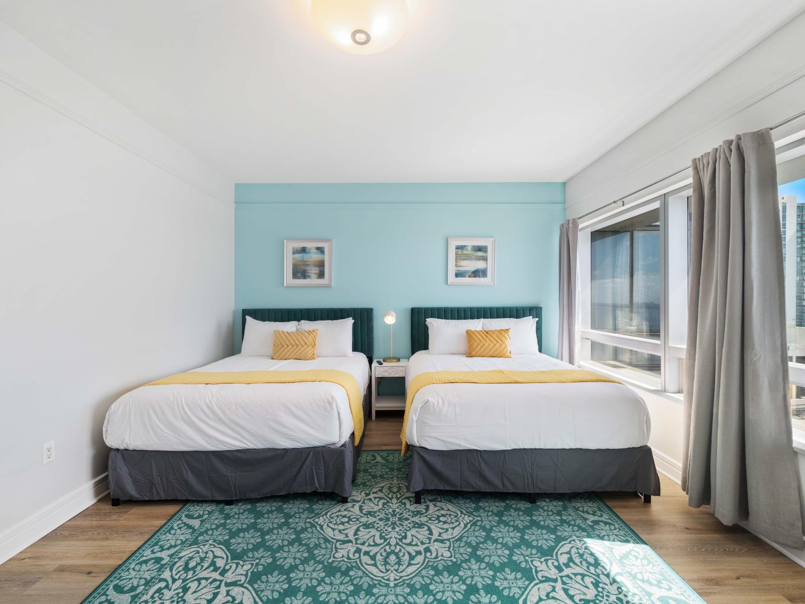 Cozy Bedroom of the Condo in Miami Florida - Well-appointed bedroom with neutral tones for a calming atmosphere - Stunning Ocean views from the bedroom window - Modern and stylish decor that complements the space