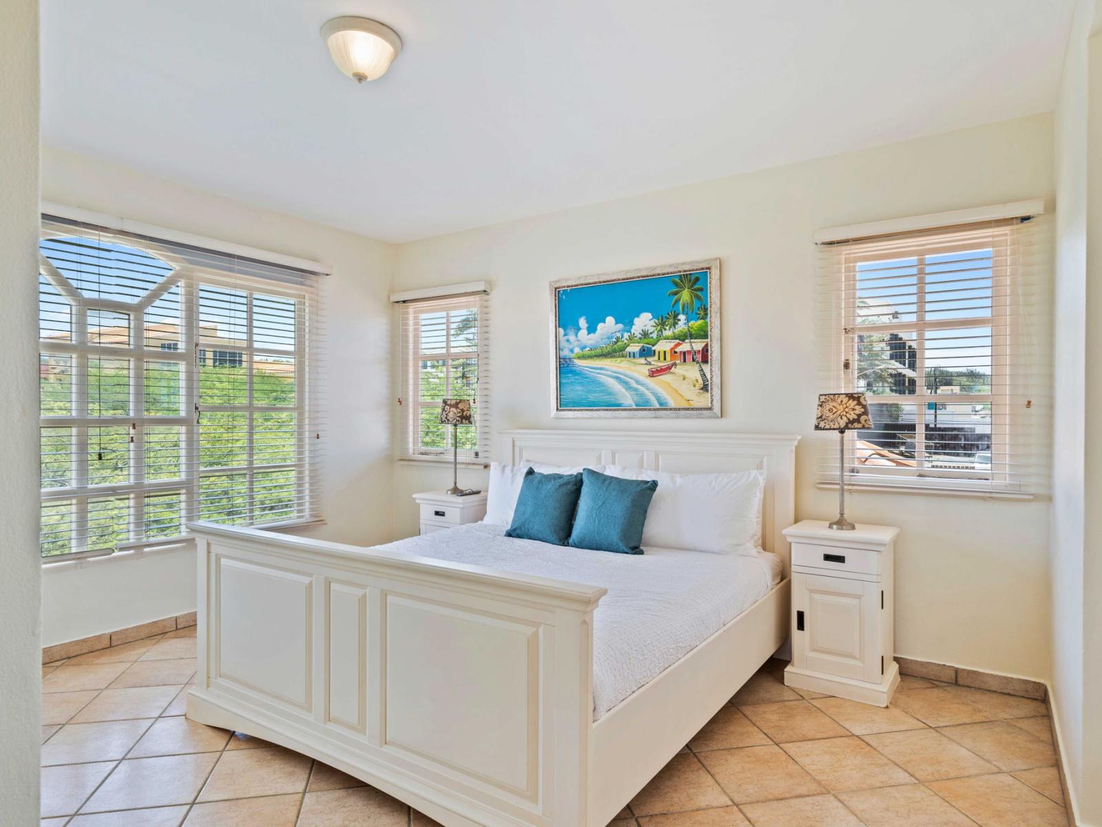 - Wake up refreshed in this bright and airy bedroom,  features a queen size bed and an attached bathroom - Cozy up in a comfortable bed surrounded by serene views and relaxing décor - A perfect retreat for restful nights and peaceful mornings