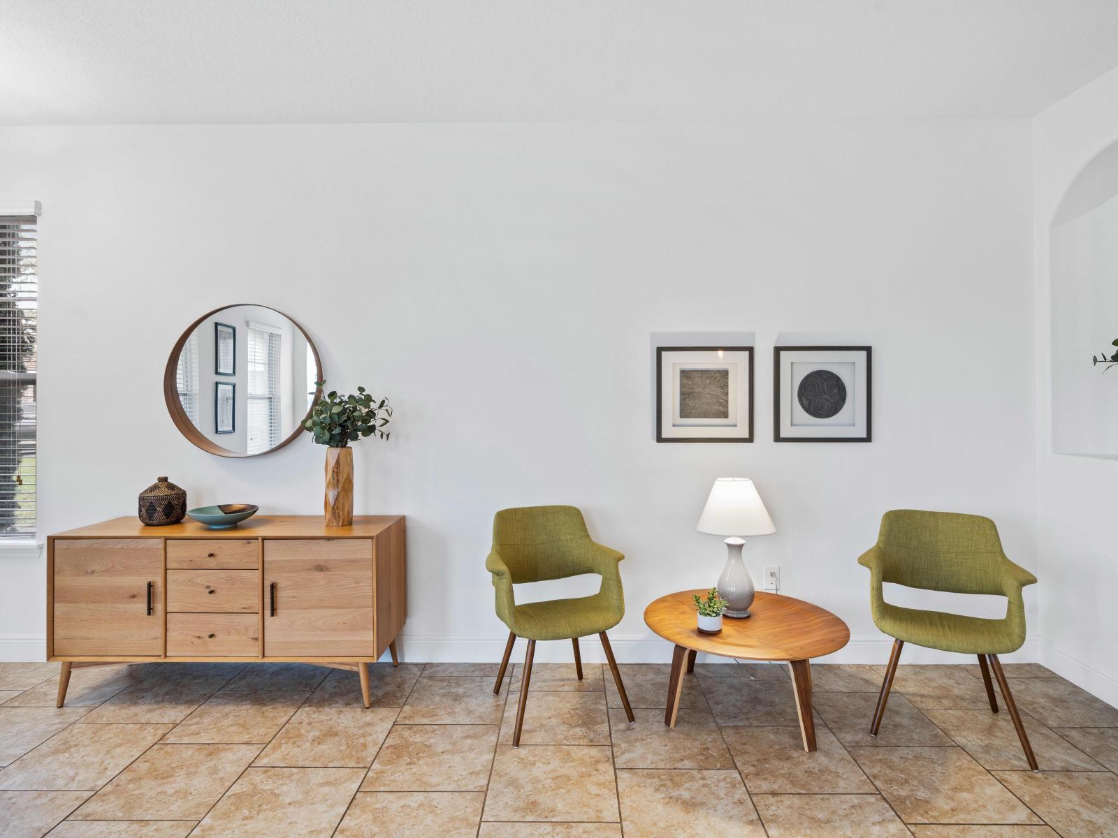 Lush Seating Area of the Apartment in Davenport - Perfect Spot for Pictures - Refreshing Atmosphere - Beautifully painted wall with decoration - Magnificently decored with refreshing plants pots