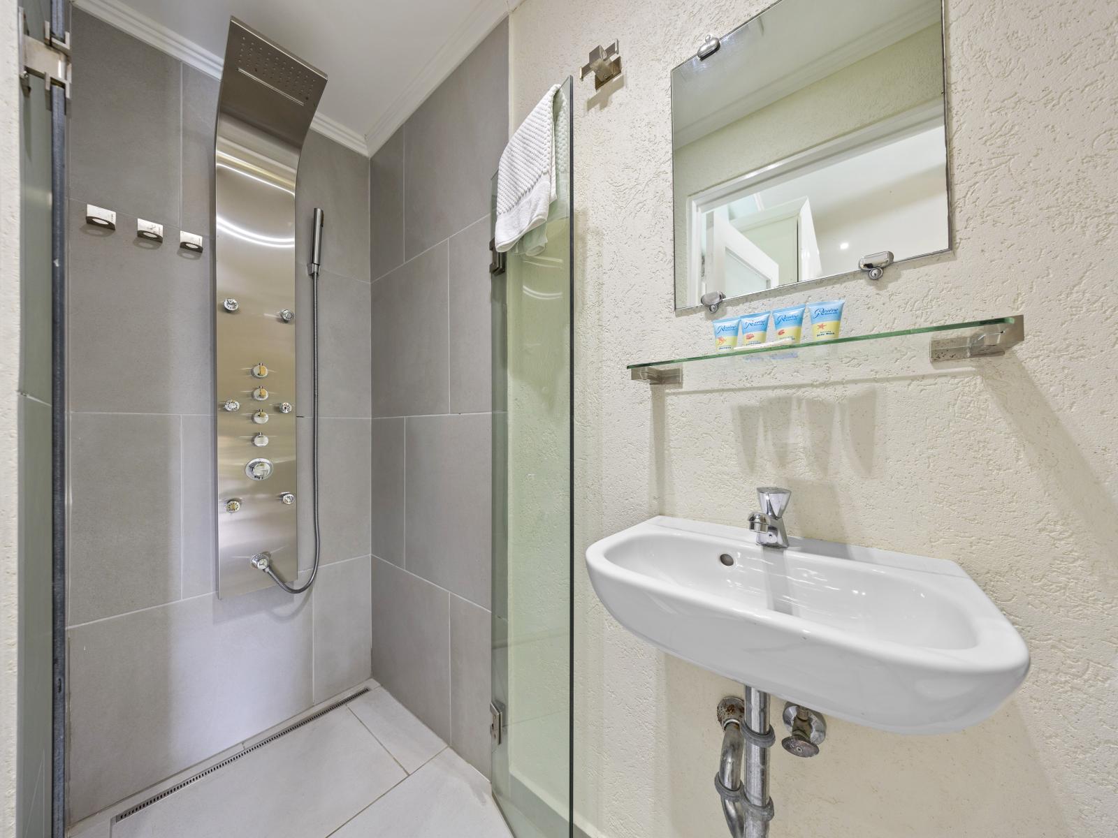 Experience the convenience of our ensuite bathroom, equipped with everything you need for a relaxing stay.